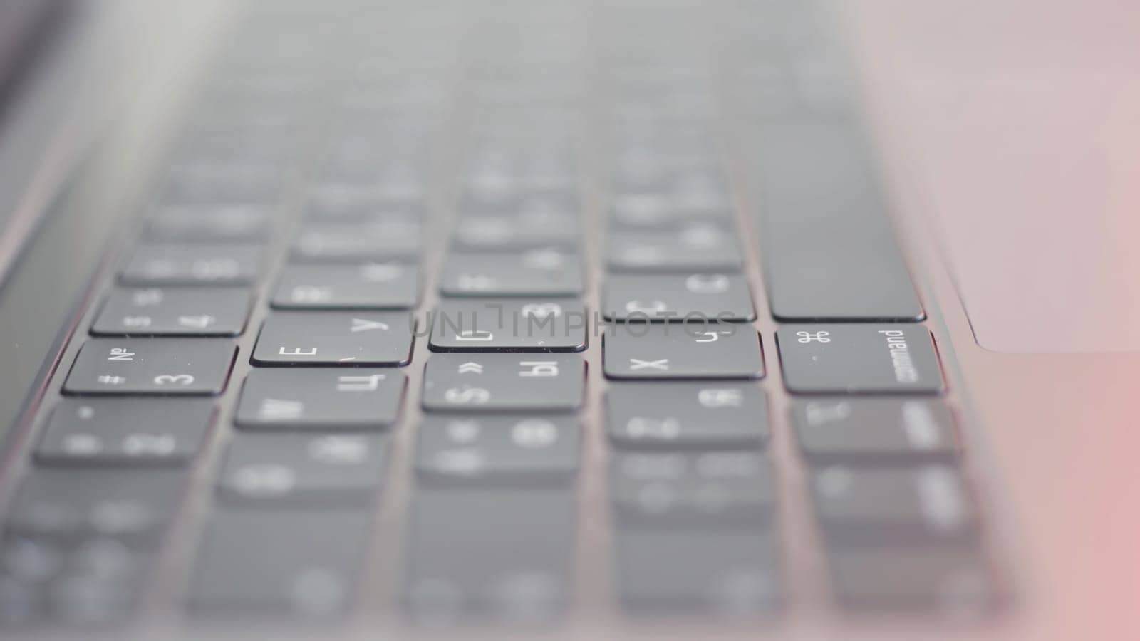 Close up of computer black keyboard. Technological background with the new modern flat keypad of the laptop.