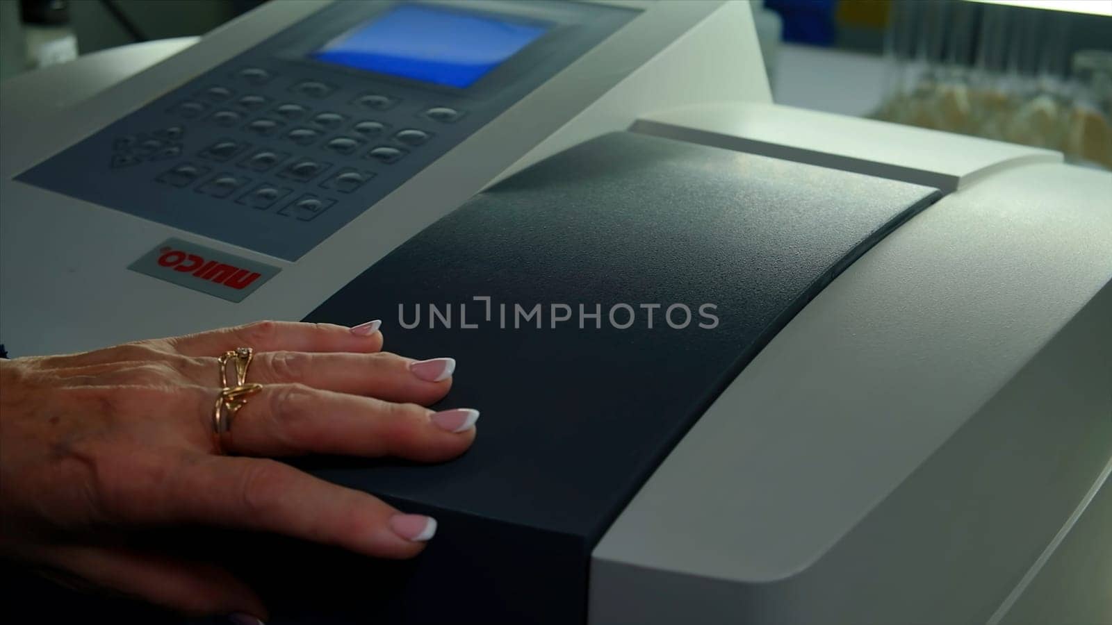 Germany - Berlin, May 15, 2023: A working printer. Clip. A special machine is filled with paint for further printing of various documents. High quality FullHD footage