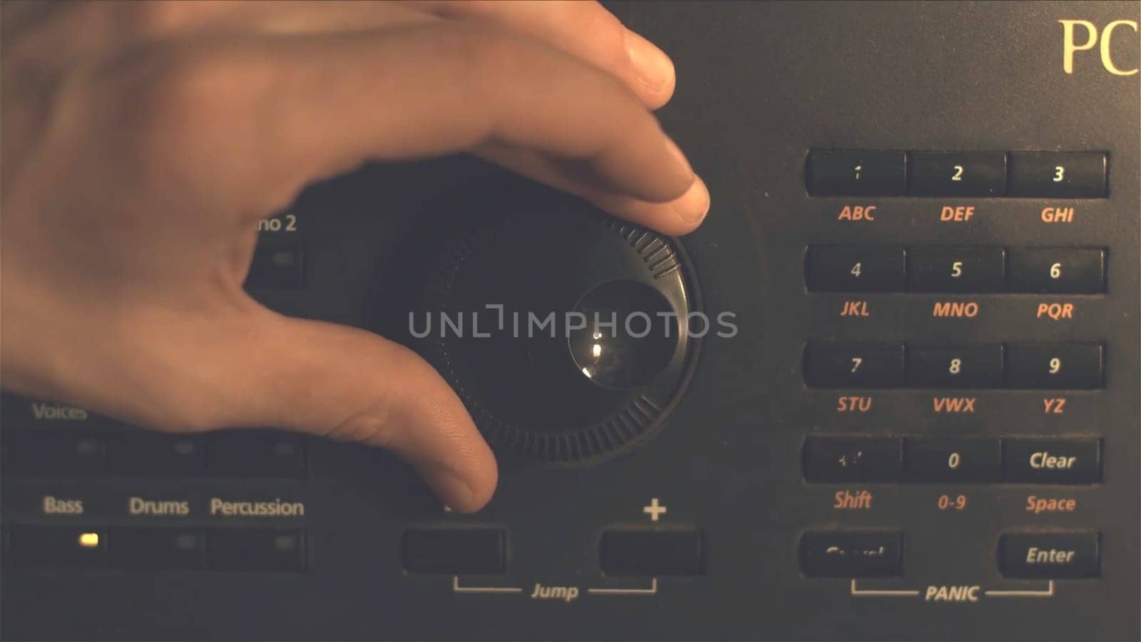 Hand tuning fm radio button. Retro image processed. Hand adjusting volume control. Broadcasting and music concept. woman turning button of radio in car. Woman hand adjusting volume control HD