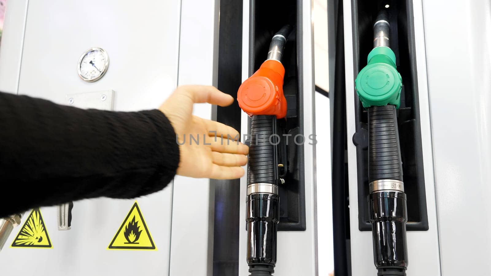 Gas station. Media.Cylinders with gasoline and gas are taken and then put in place for refueling the car. High quality 4k footage