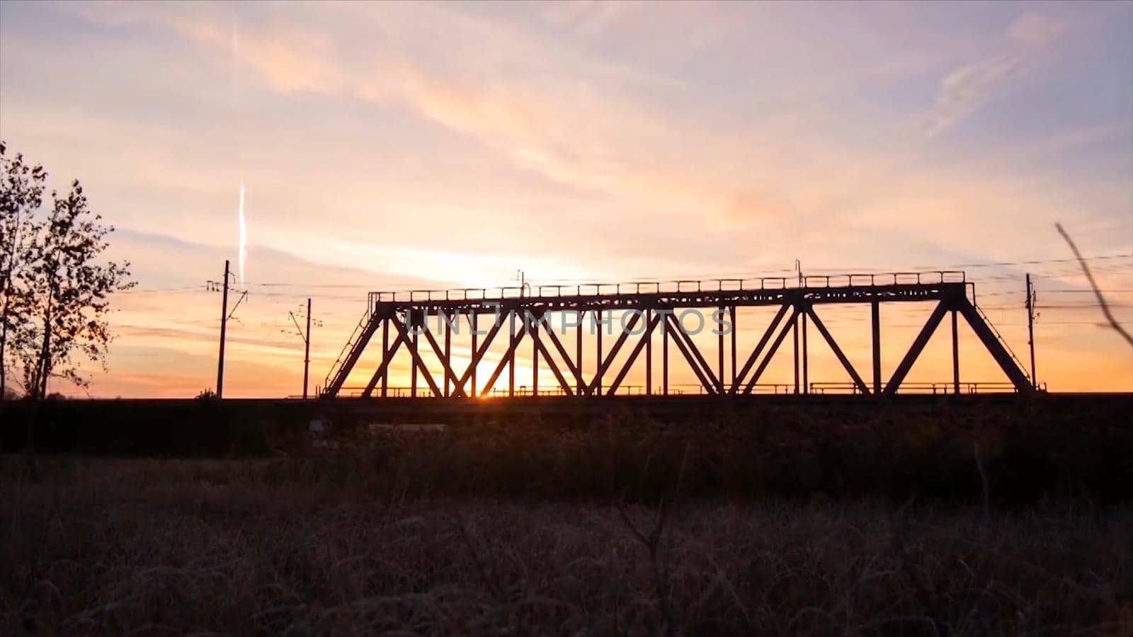 Bridge road. Train traffic transportation. Timelapse railway bridge on sunrise.