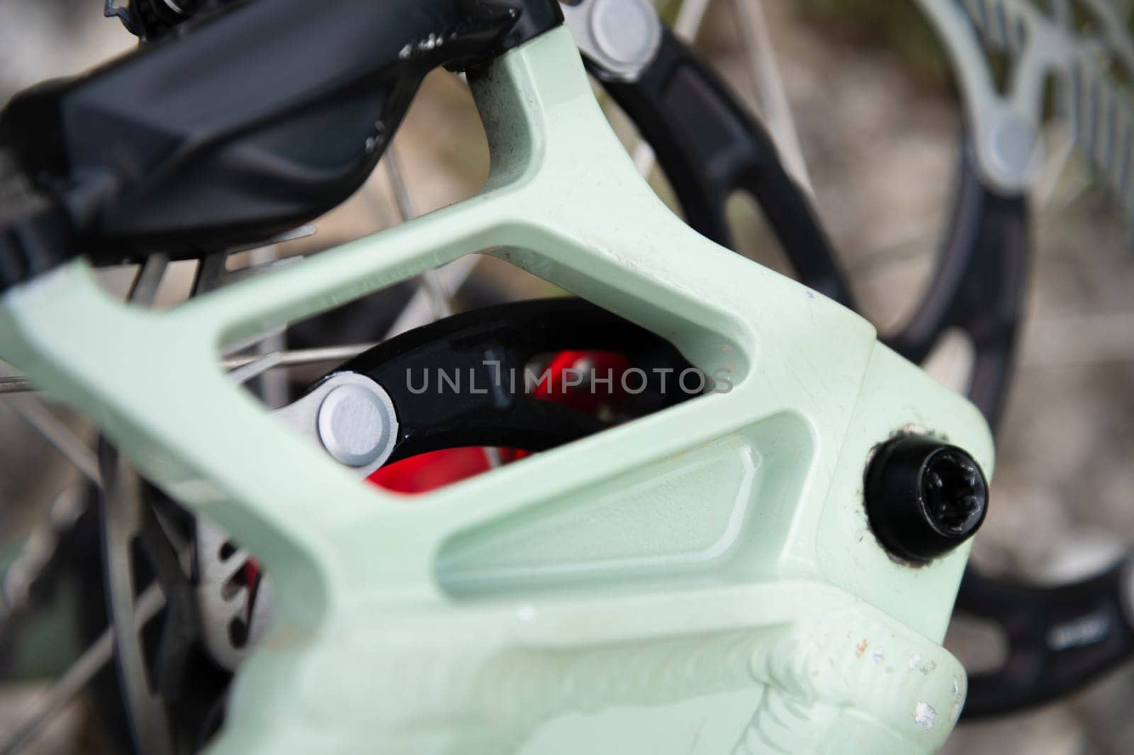 Close-up of a bicycle frame. Macro shot of mounting the frame on a bicycle, where the bolt is screwed in.