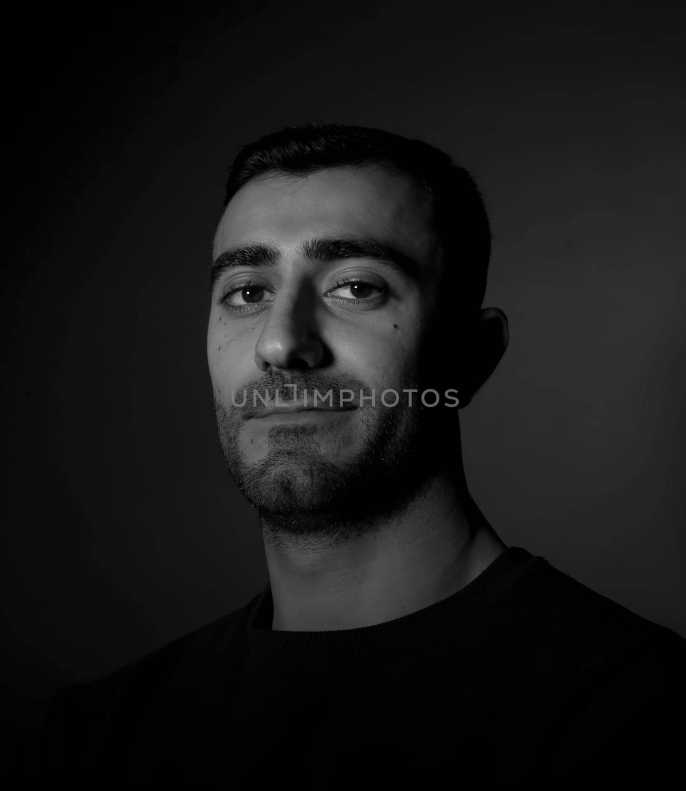 Portrait of a young man with a beard. Toned. High quality photo