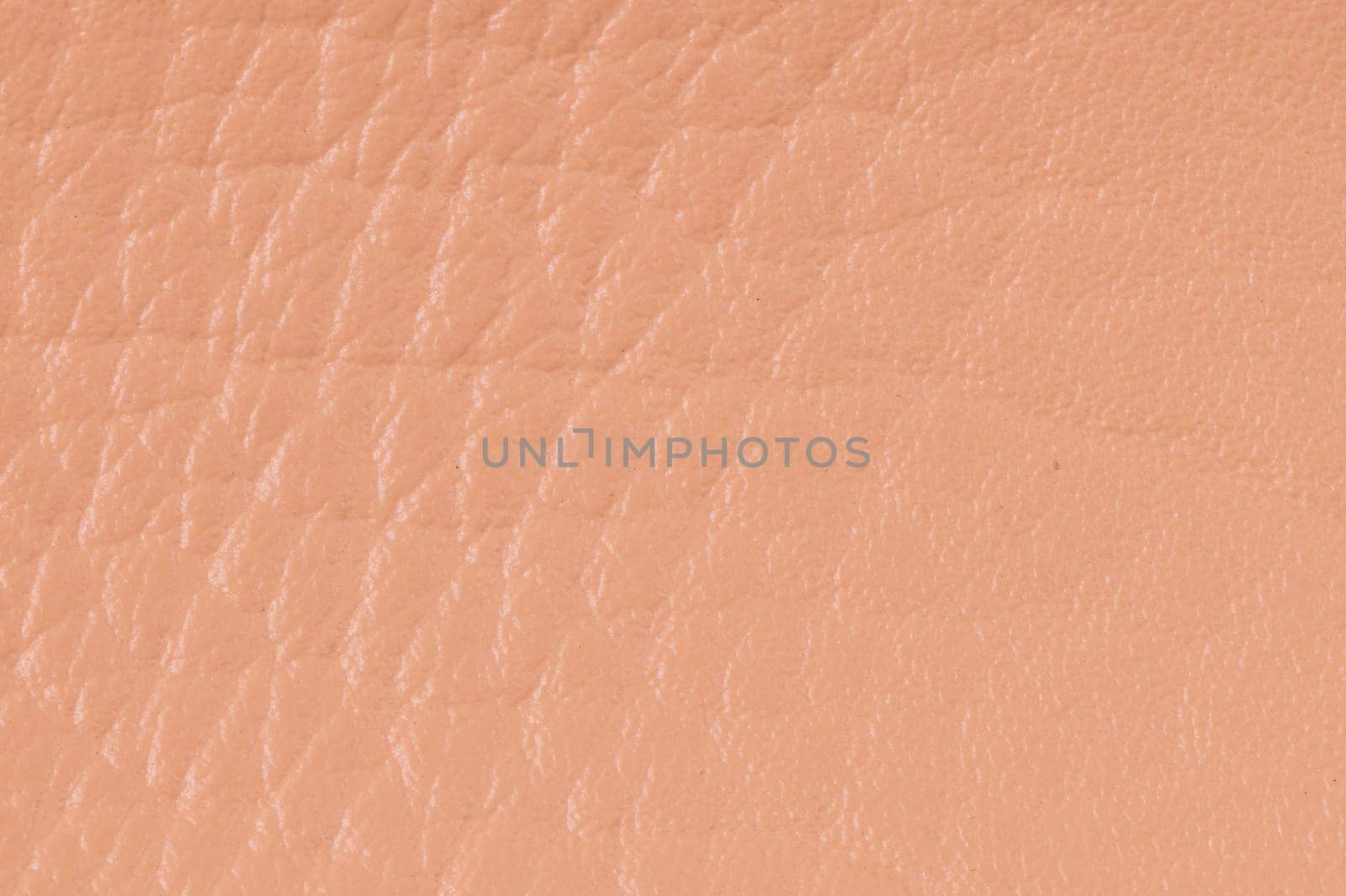 Closeup of detailed brown leather texture background.