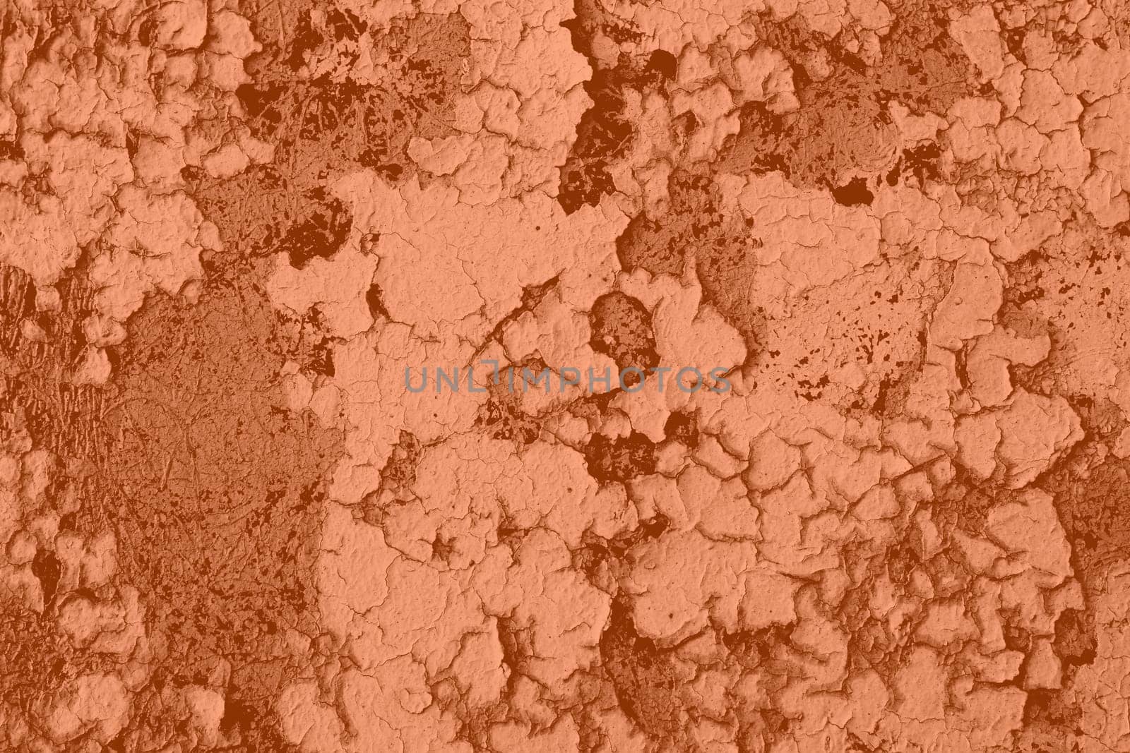 Peach Fuzz wall with dirty scratches and metal stains. Metal rust monochrome background. Color of the 2024 year. High quality photo
