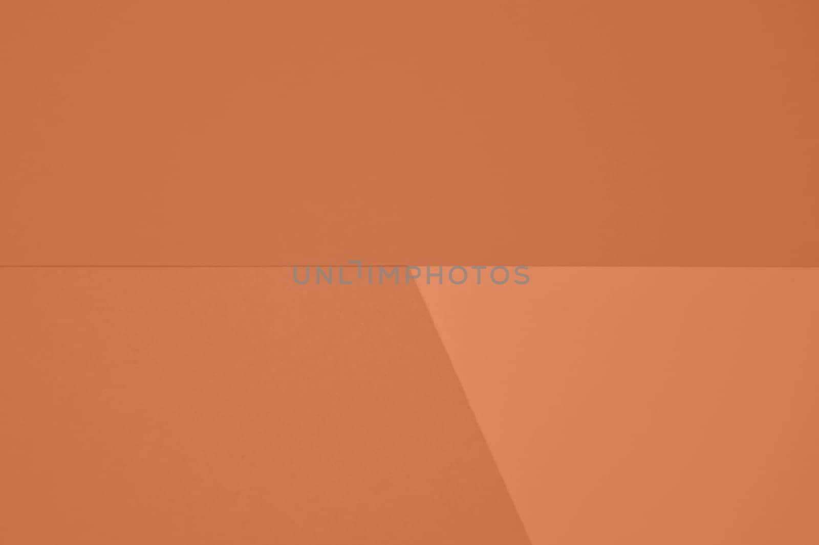 Peach Fuzz monochrome paper background. Color trend 2024 monochrome. Copy space. High quality photo