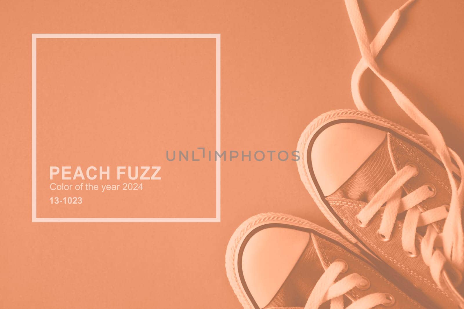 Peach Fuzz monochrome sneakers. Trendy color 2024 concept. High quality photo