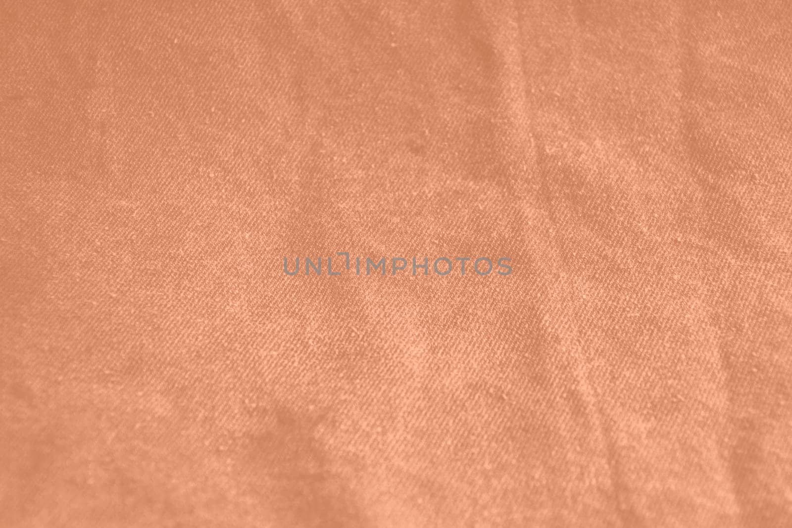 Peach fuzz colour monochrome texture knitted fabric. Peach knitted Jersey as textile background. Monochrome color background. Wool knitting texture. Trendy color 2024. by kizuneko