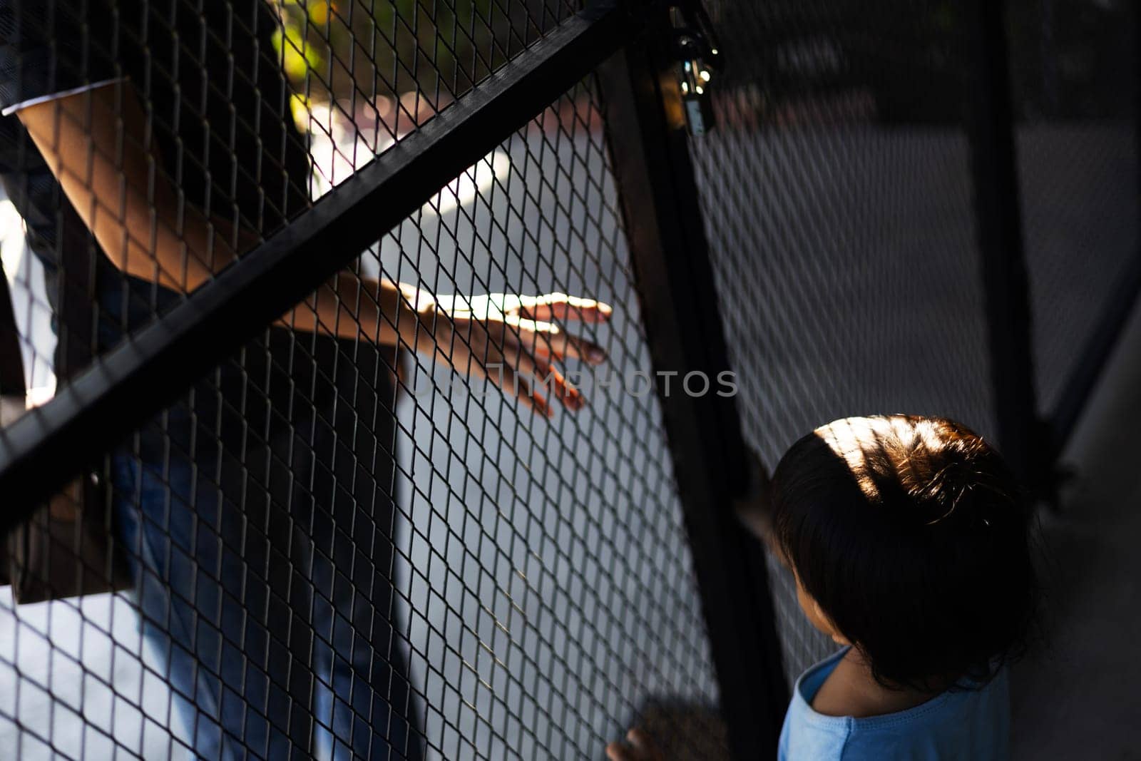 Little Boy opening the door to the robber. Child Is Opening The Door To Stranger. Little boy alone at home.