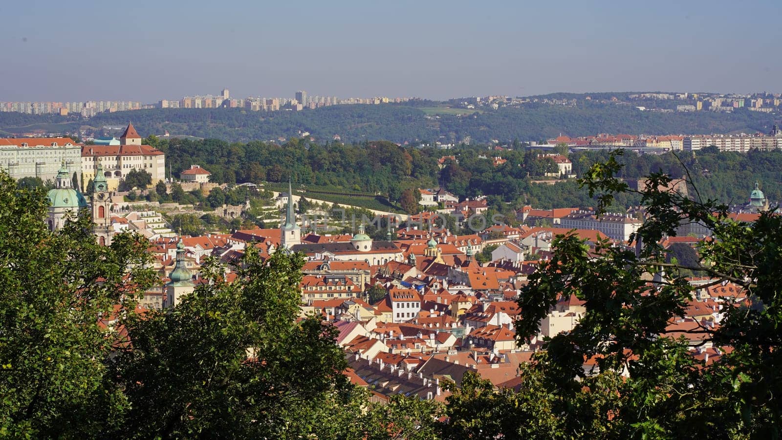 Prague. Beautiful city park. Early autumn in the city. Trees and benches for rest in the park by aprilphoto