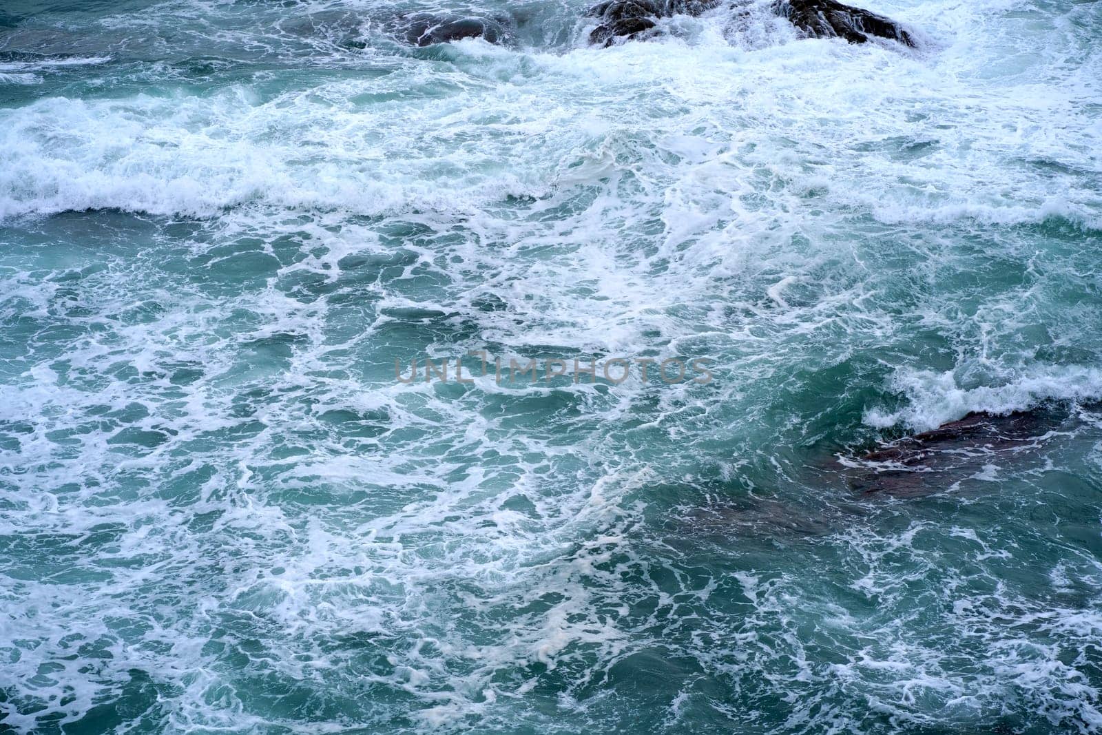 Element. Storm waves on the sea.Texture of the stormy sea. Beautiful texture of big power dark waves with white foam. by aprilphoto