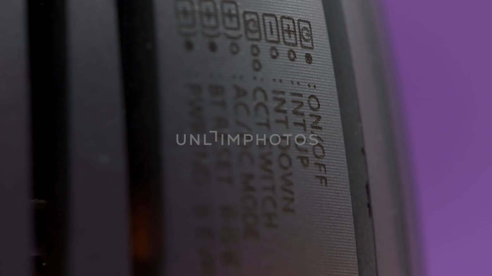 Close up of electronic device with designation of symbols. Action. Concept of technological progress