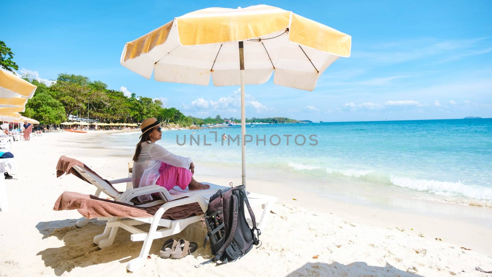 Asian woman on a beach chair on the beach of Koh Samet Island Rayong Thailand by fokkebok