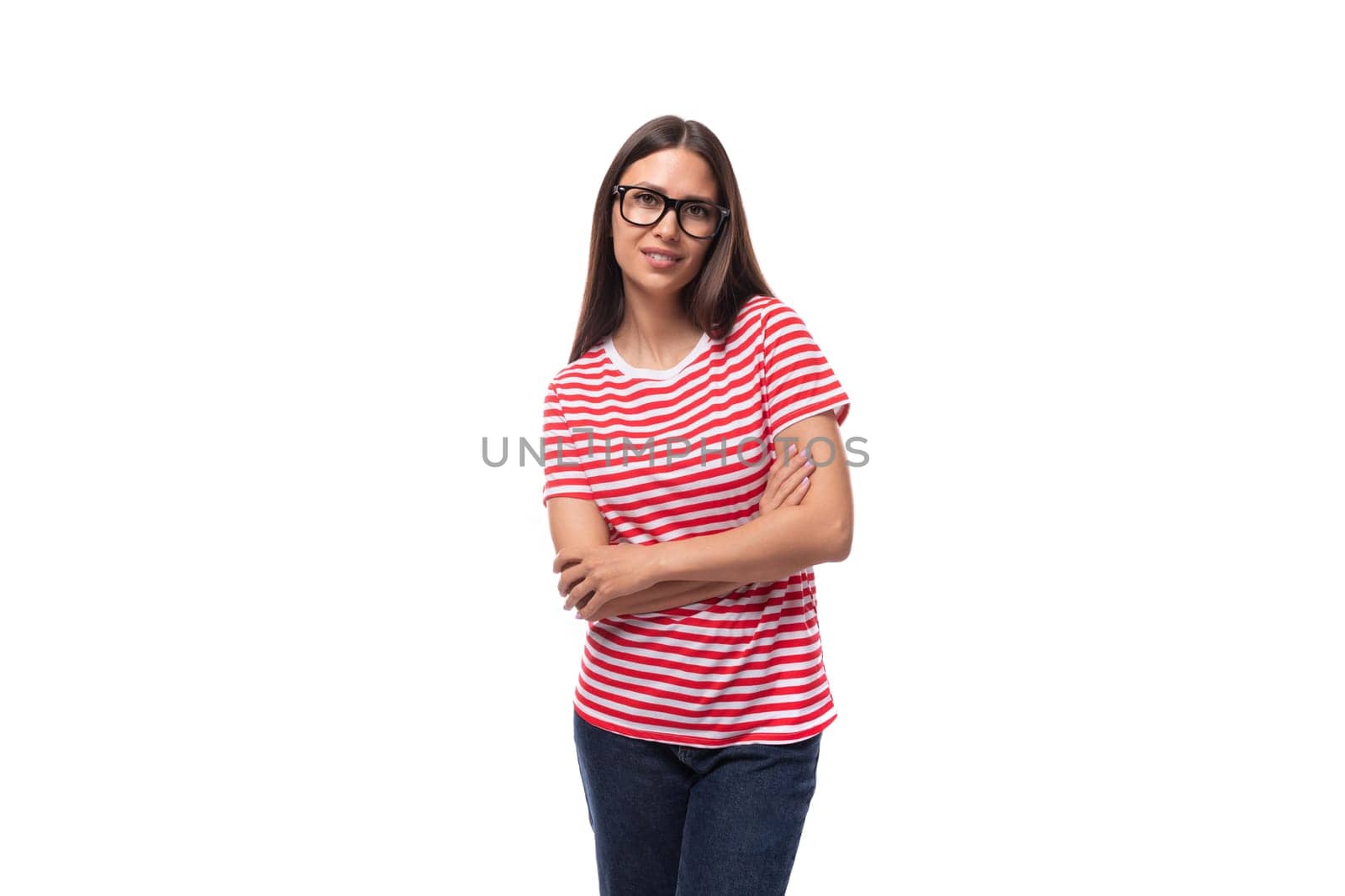 portrait of a young well-groomed european woman with straight black hair in glasses on a white background with copy space by TRMK