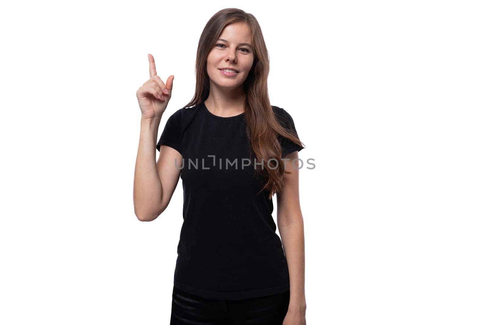 Portrait of a young well-groomed woman dressed in a basic T-shirt by TRMK