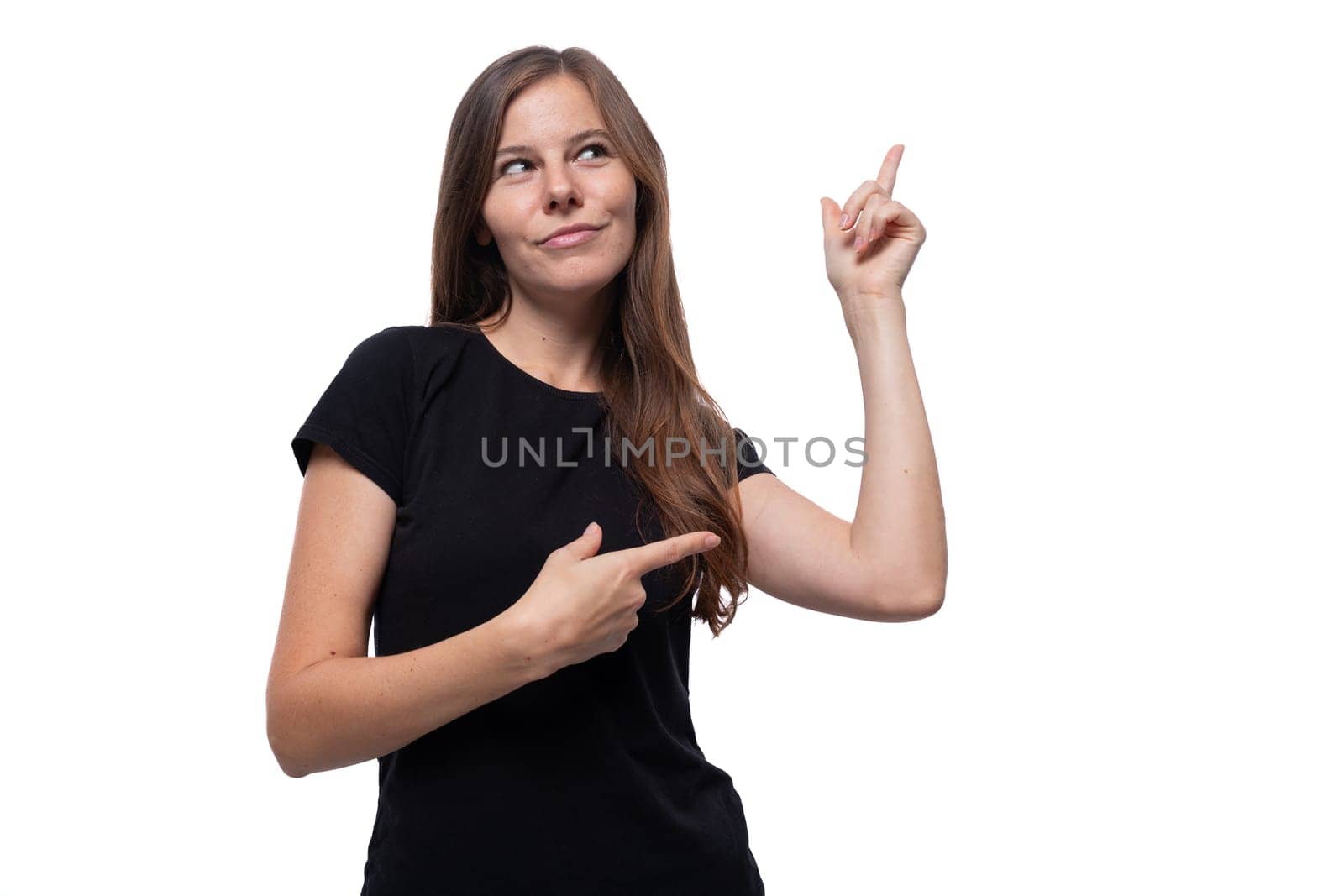Close up portrait of smart cute woman pointing her hand up.