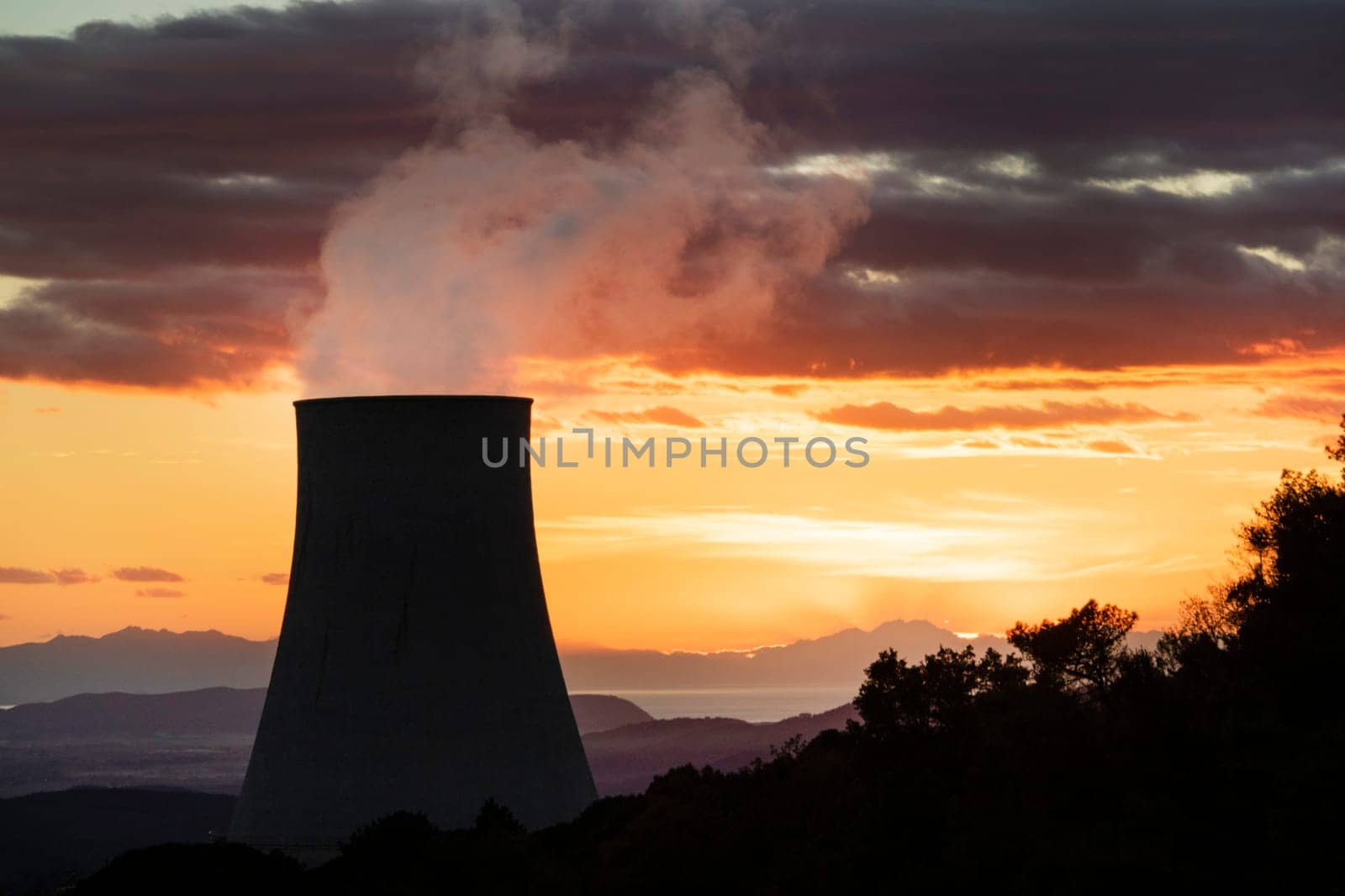 Sunset on the cooling chimney of the boraciferous blowers  by fotografiche.eu