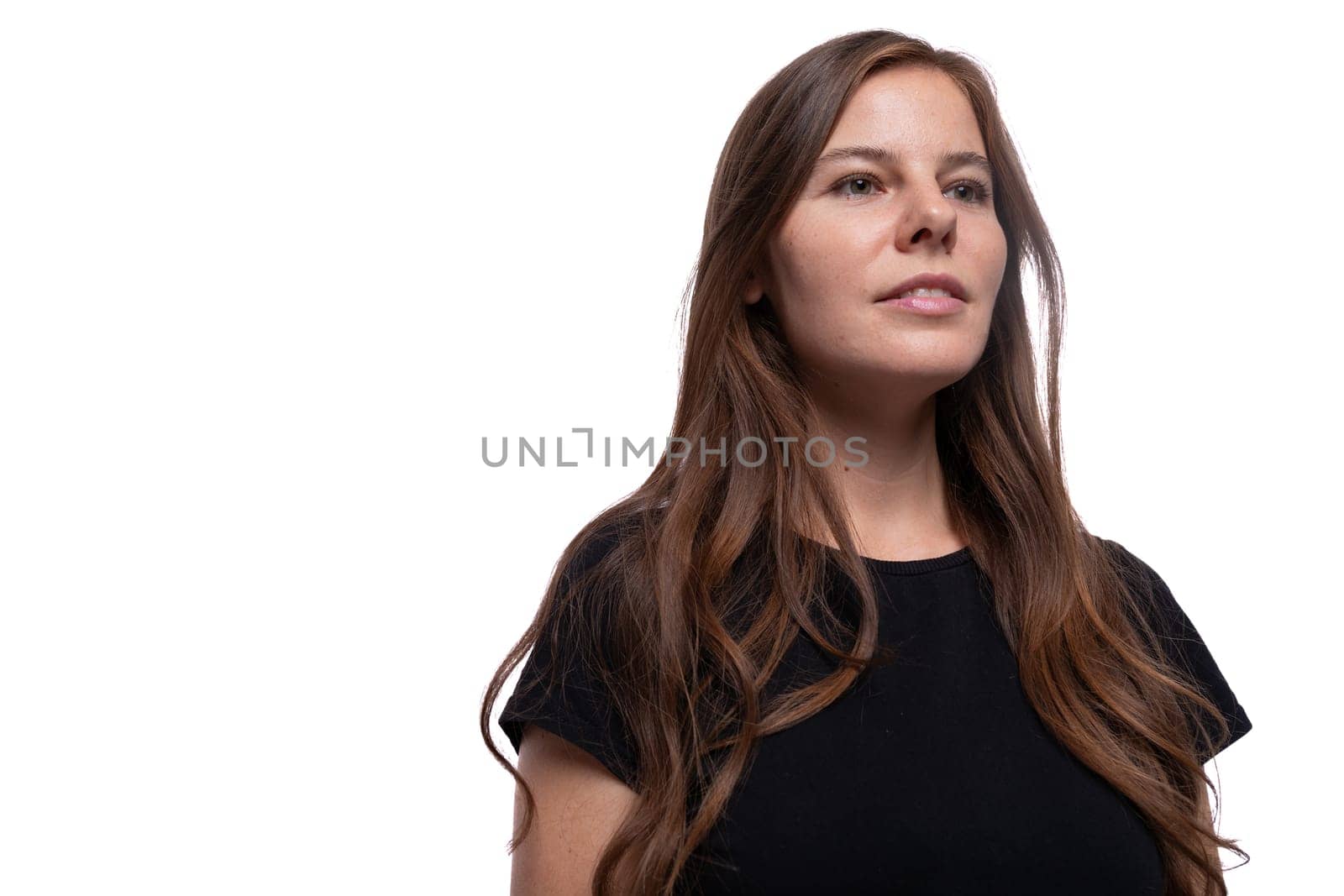 Young slim woman with gorgeous brown hair closeup by TRMK