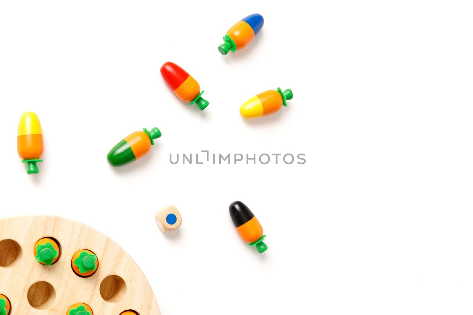 Top view of kids wooden board game for memory development, isolated on white background, copy space.