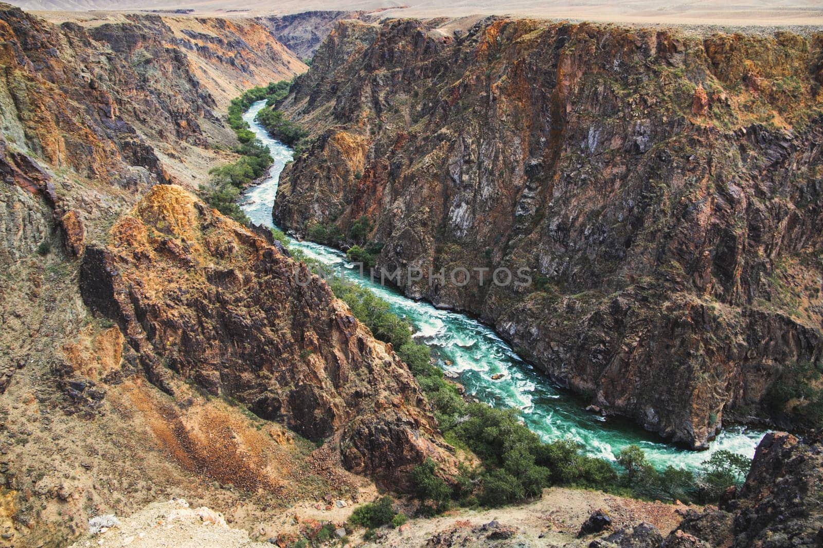 Top view of the Charyn river, in the gorge that flows through the Charyn canyon in Kazakhstan in the Almaty region, Nature of Central Asia.