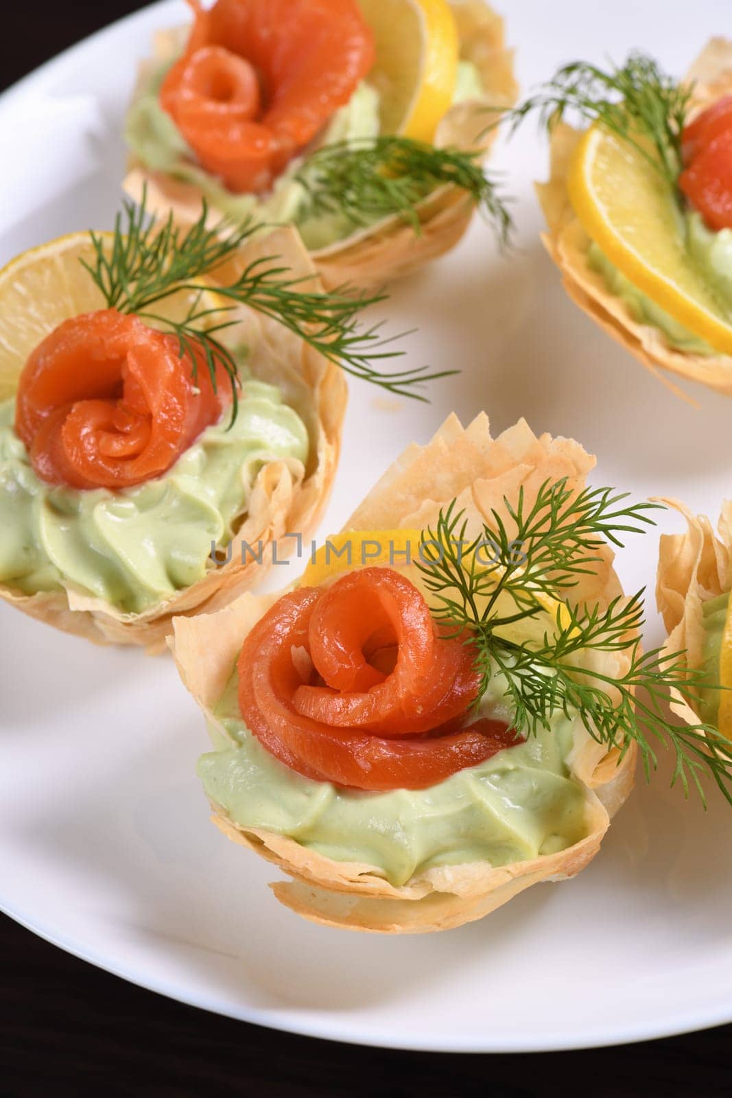 Filo dough baskets with avocado pate and salmon by Apolonia