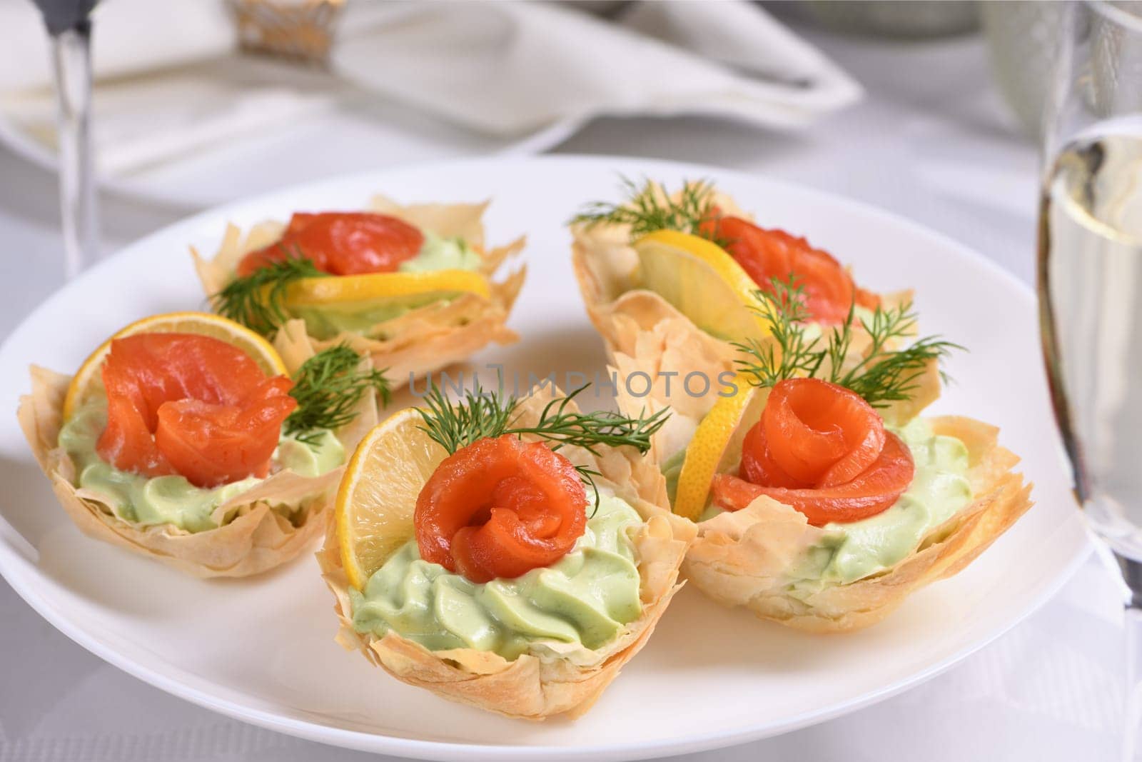Filo dough baskets with avocado pate and salmon by Apolonia