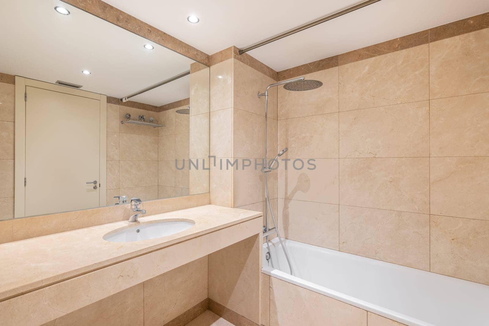 Standard bathroom with bathtub shower system and washbasin by apavlin