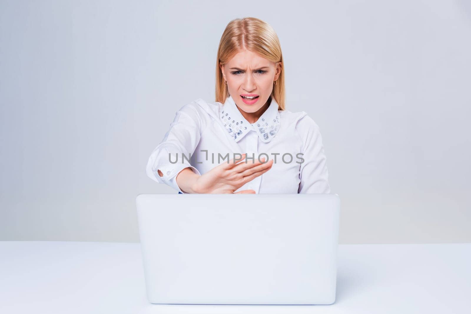 Young businesswoman working at laptop computer. by nazarovsergey