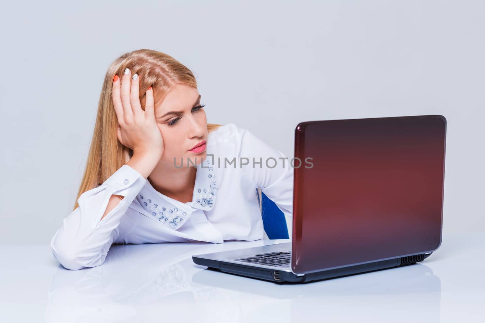 Young businesswoman working at laptop computer. tired girl soon fell asleep stress