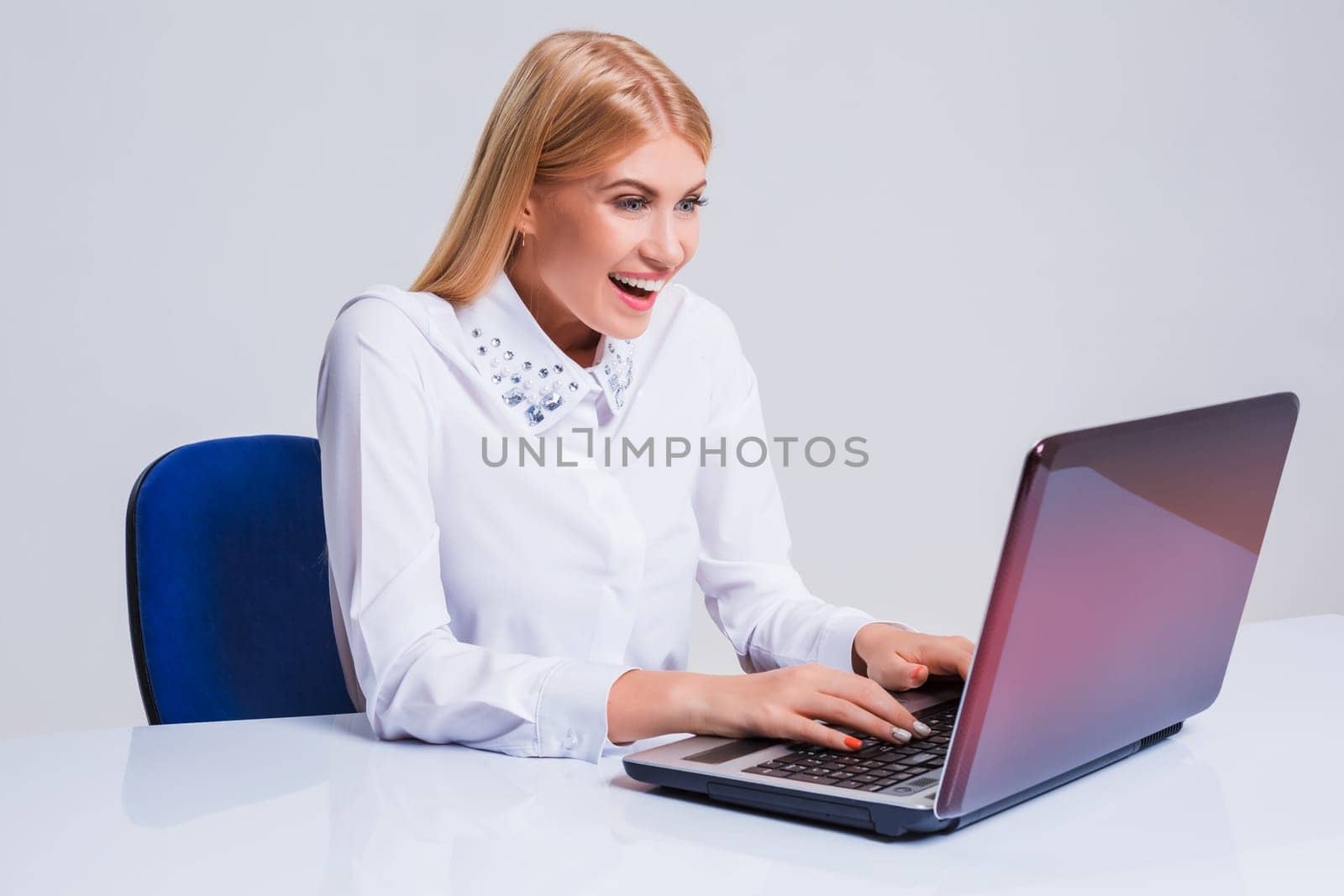 Young businesswoman working at laptop computer. by nazarovsergey
