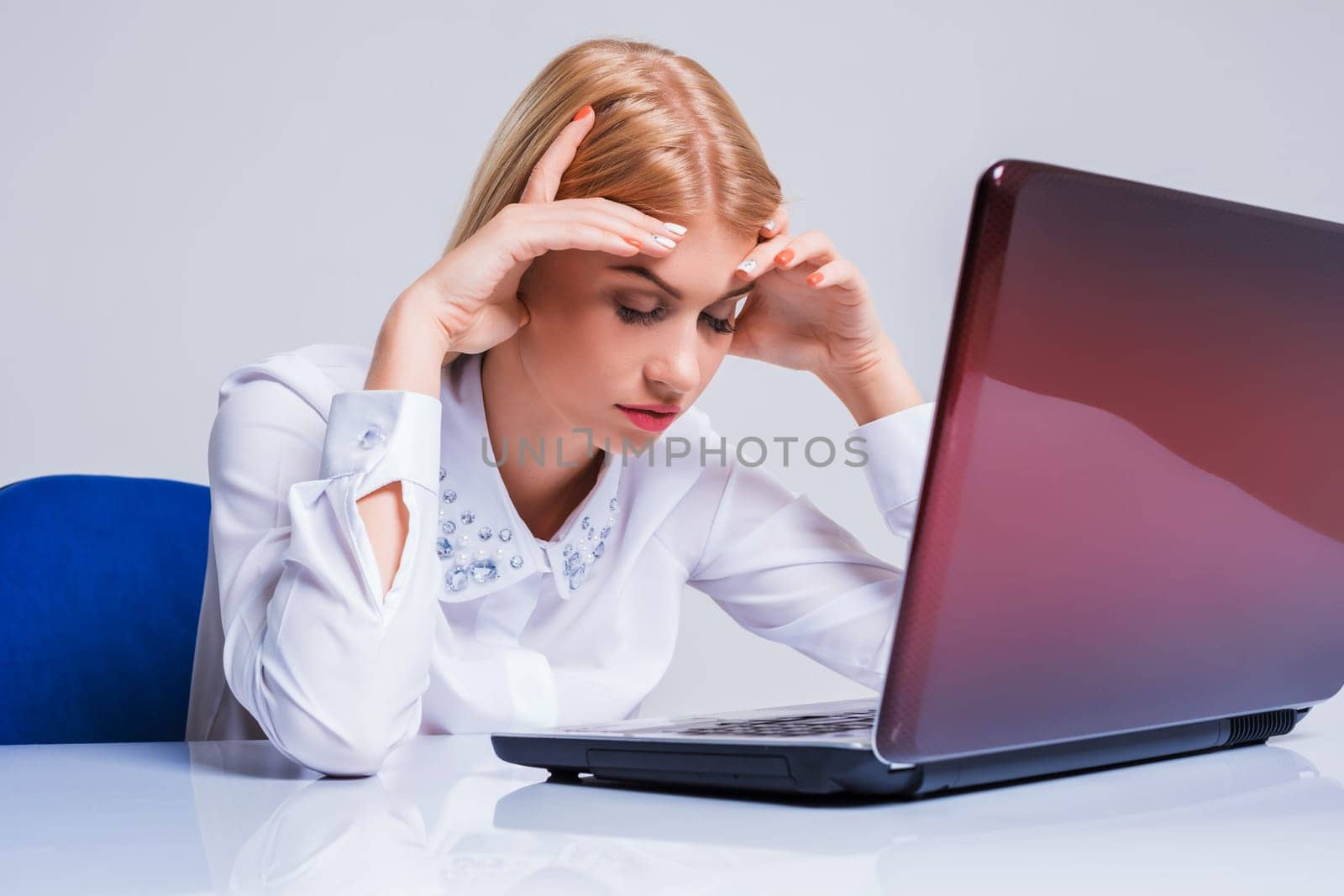 Young businesswoman working at laptop computer. tired girl soon fell asleep stress