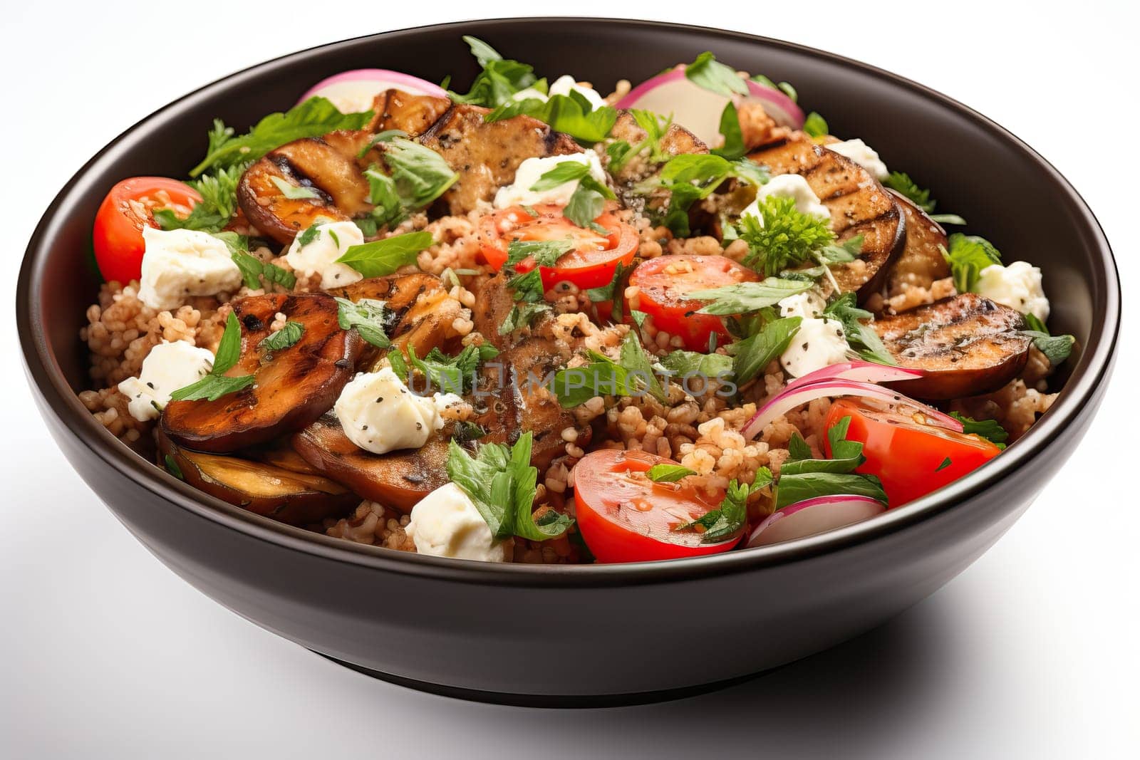 A bowl of buckwheat with a salad of tomatoes, cheese and purple onions, a dish for weight loss.