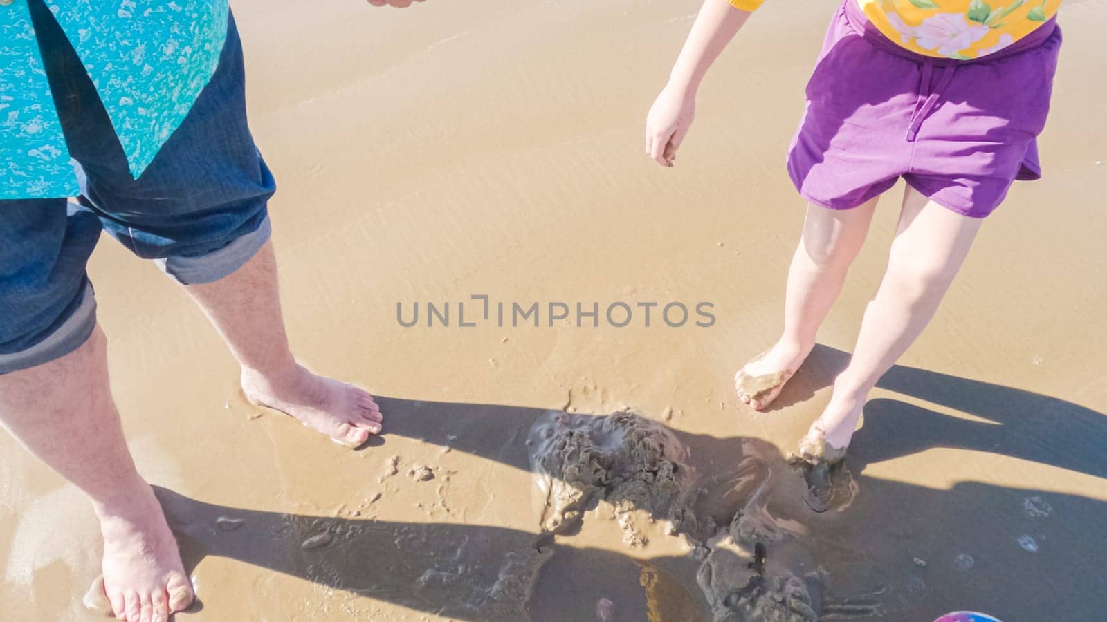 Little girl winter clamming at Pismo Beach by arinahabich