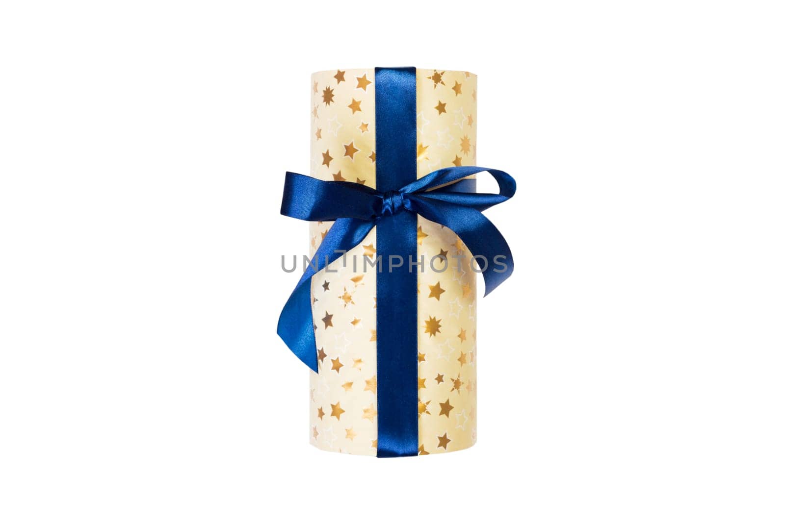 Christmas or other holiday handmade present in gold paper with blue ribbon. Isolated on white background, top view. thanksgiving Gift box concept.