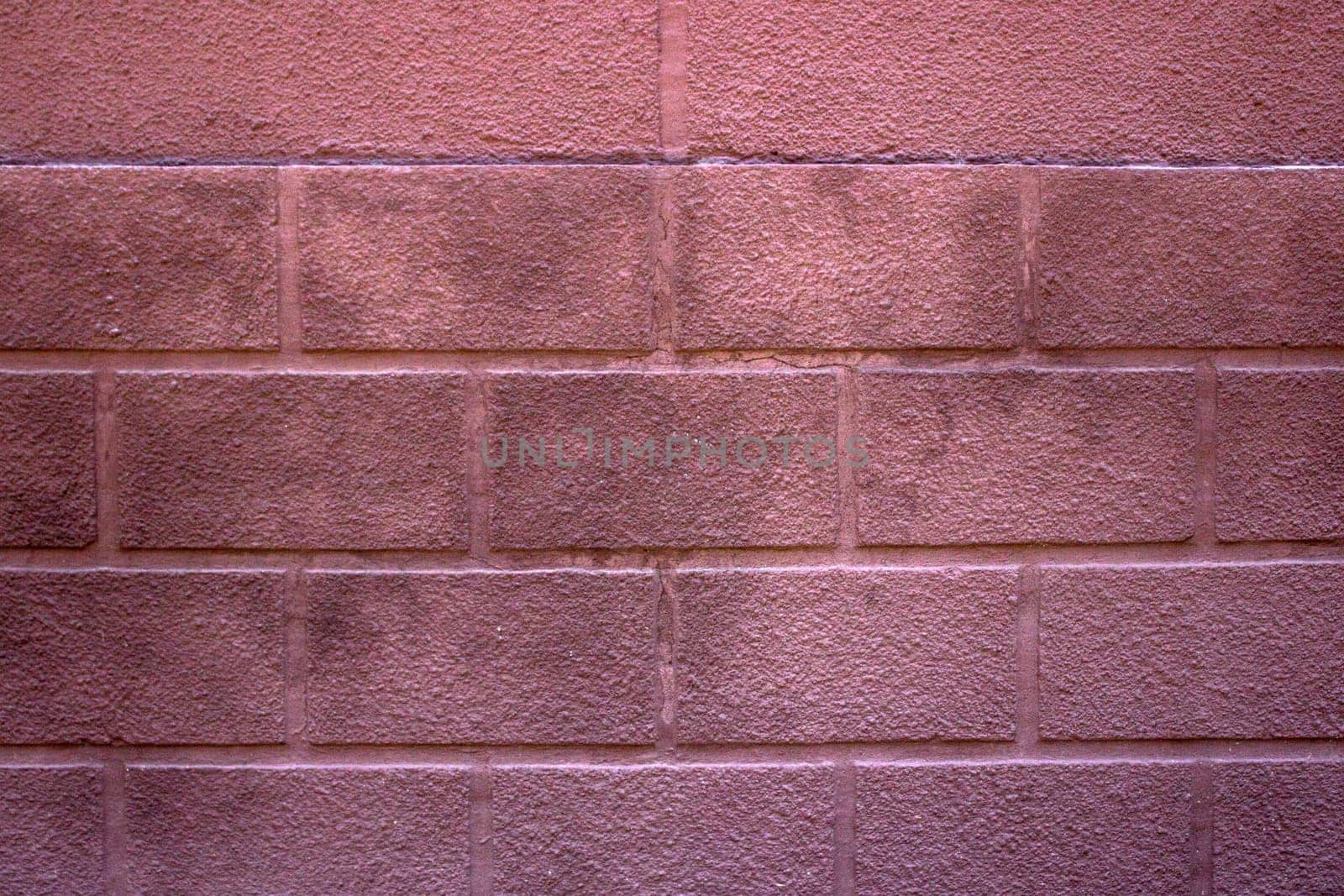Seamless red painted brick wall texture. Pale colors by Snegok1967