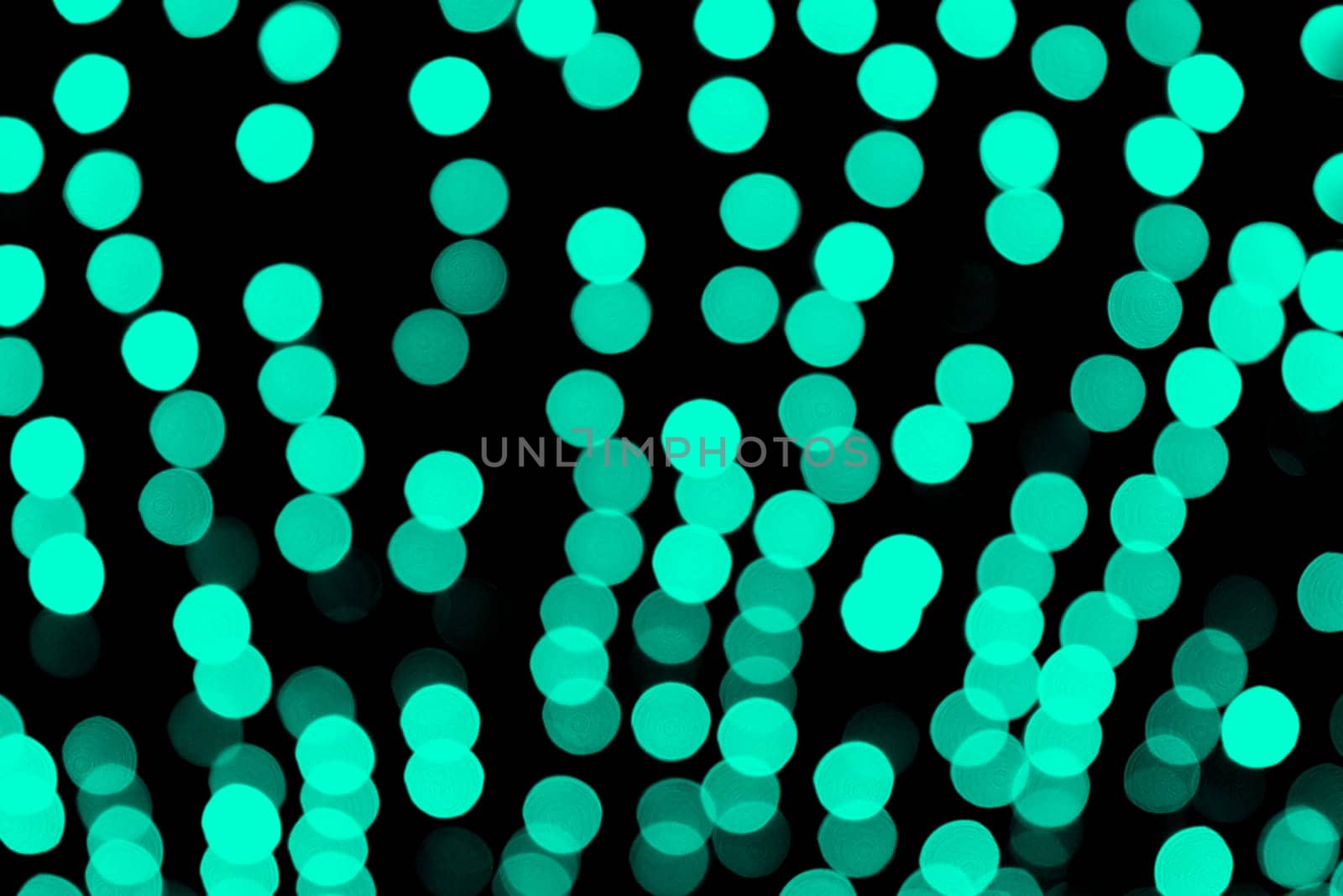 Unfocused abstract colourful bokeh black background. defocused and blurred many round blue light by Snegok1967