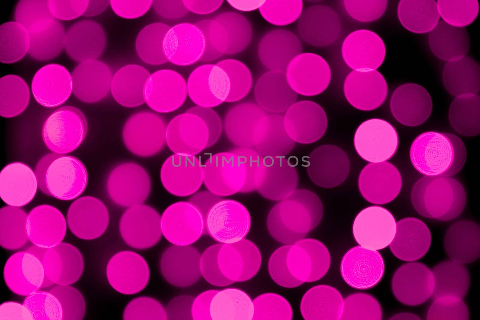 Unfocused abstract colourful bokeh purple background. defocused and blurred many round purple light by Snegok1967