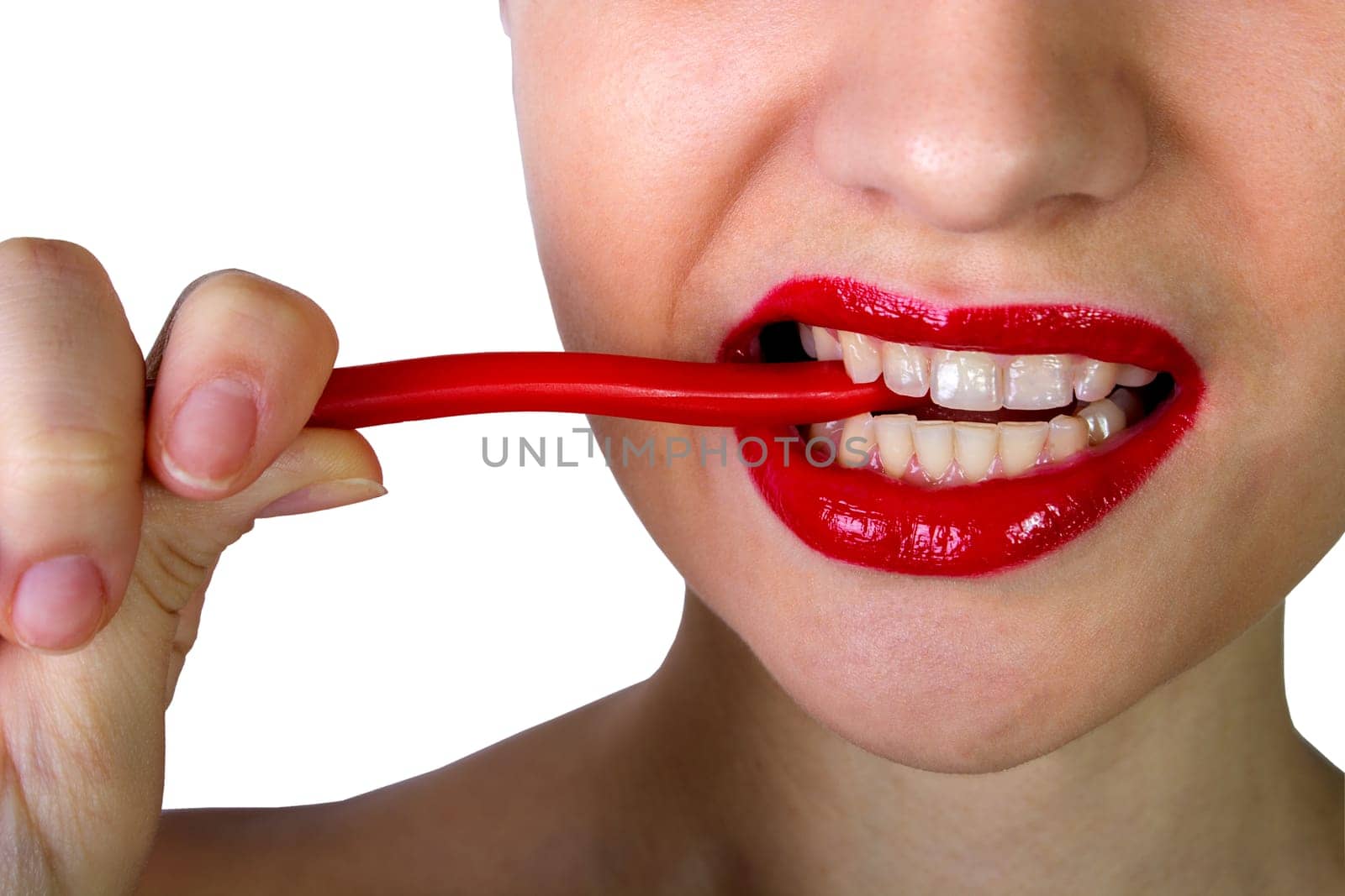 Sexy woman with red lips holding lollipop, beauty closeup