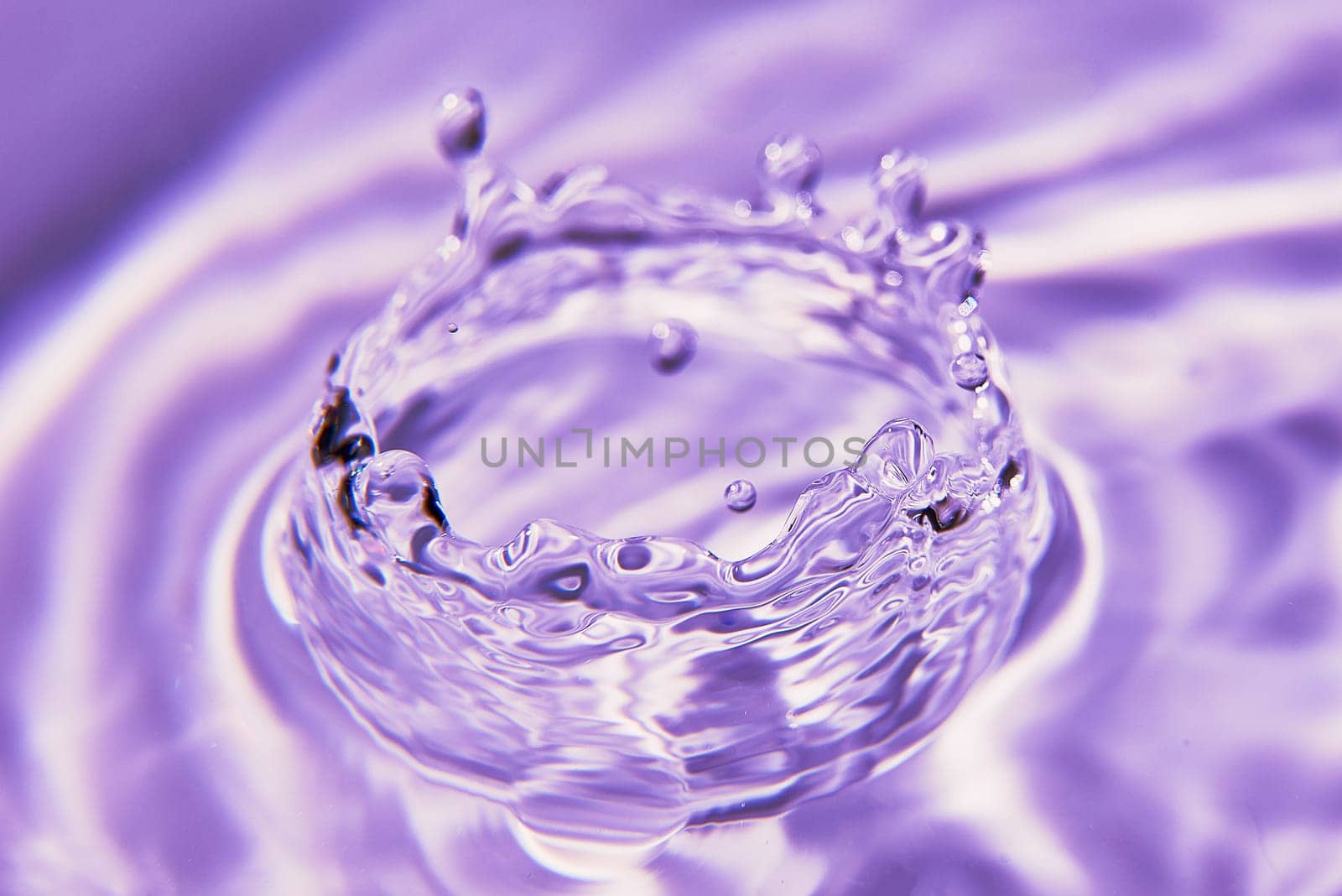 037.One or more drops of water splashing into waves and undefined shapes. Wallpaper by raul_ruiz