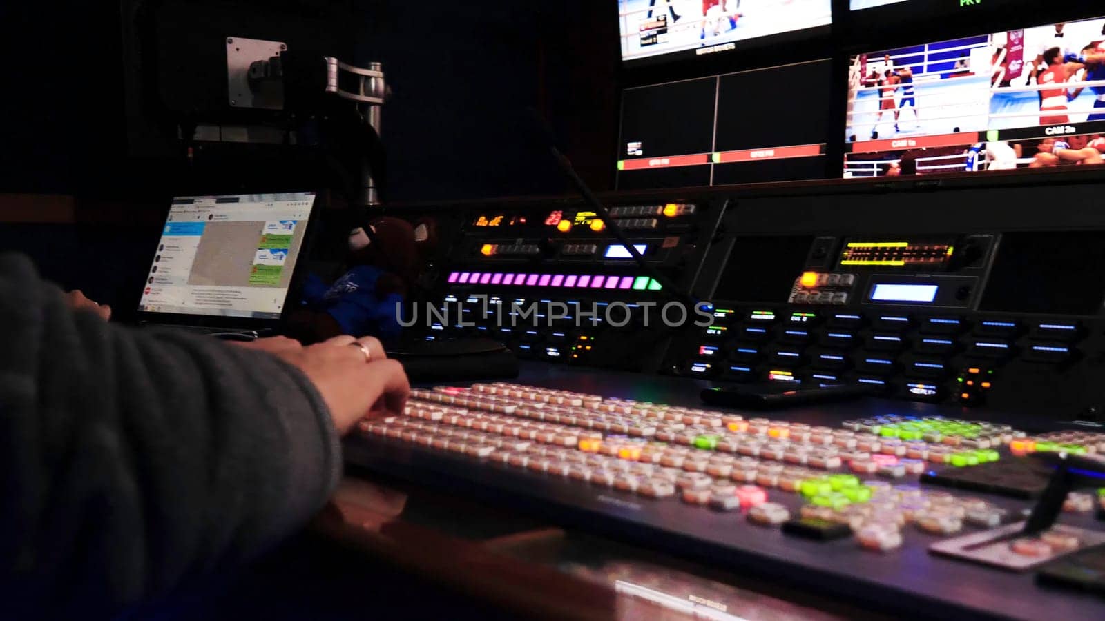 Control panel of TV Studio. Stock footage. Many different luminous buttons on TV equipment in recording Studio. Professional control panel for recording and editing TV show.