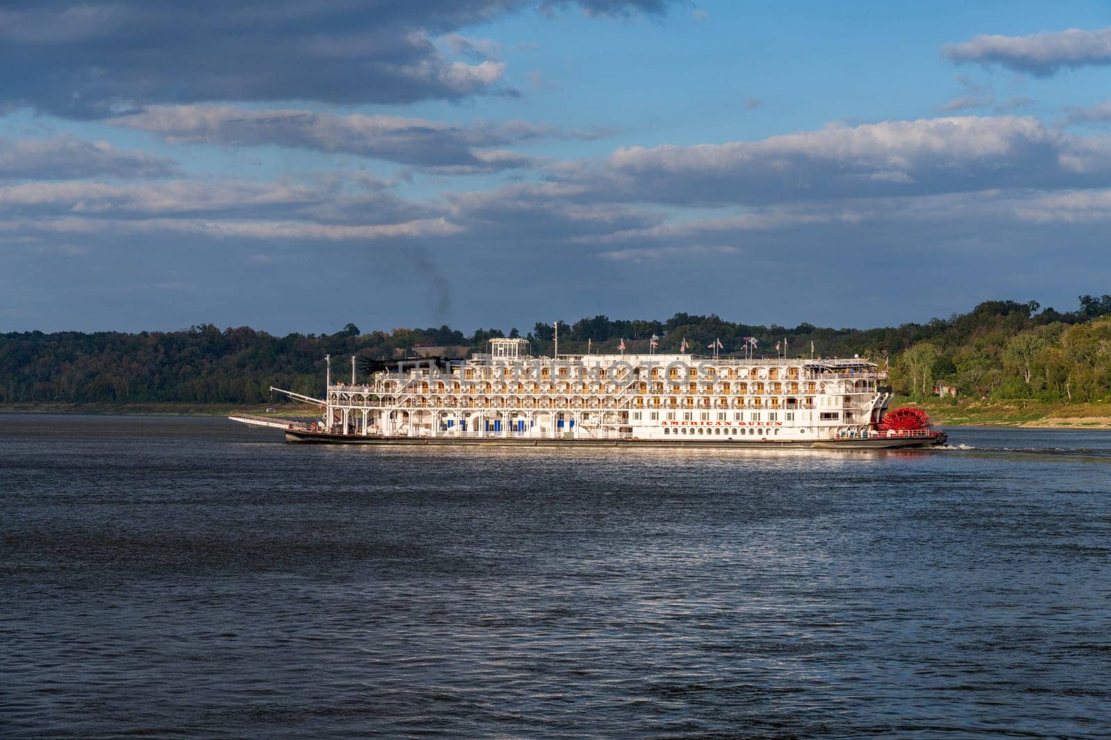 Natchez, MS - 26 October 2023: Paddle steamer river cruise boat American Queen departs in low water from Natchez Mississippi