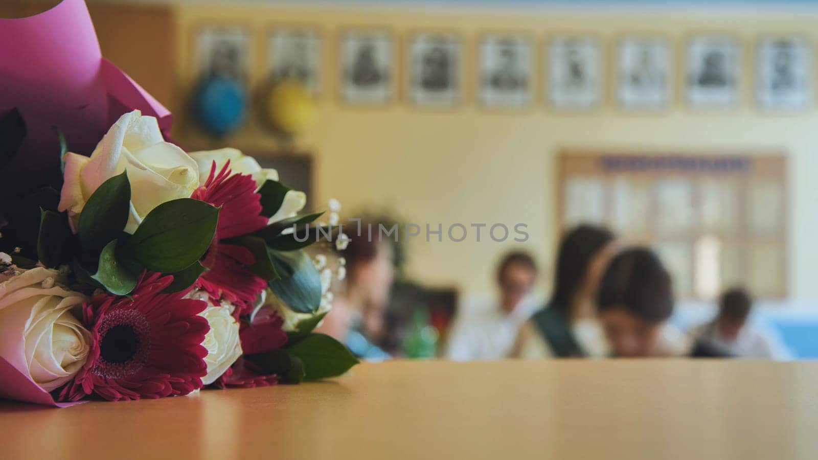 First day of school. Flowers lie on the table to celebrate the day of school