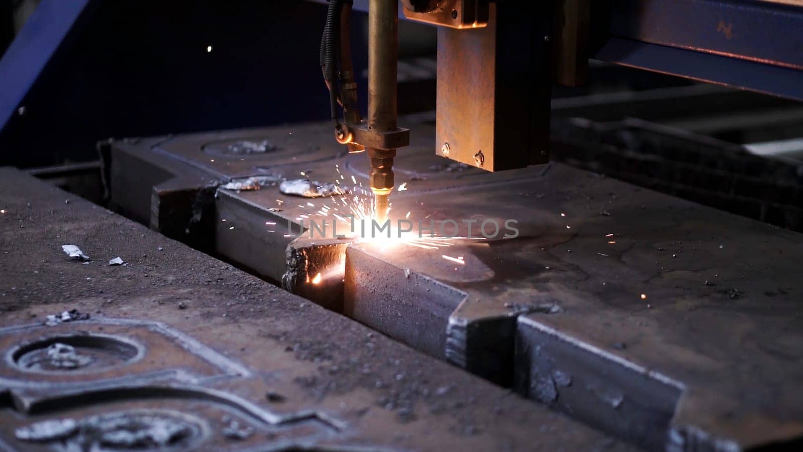 Laser plasma cutting of metal . Clip . Colorful production process at a metallurgical factory .