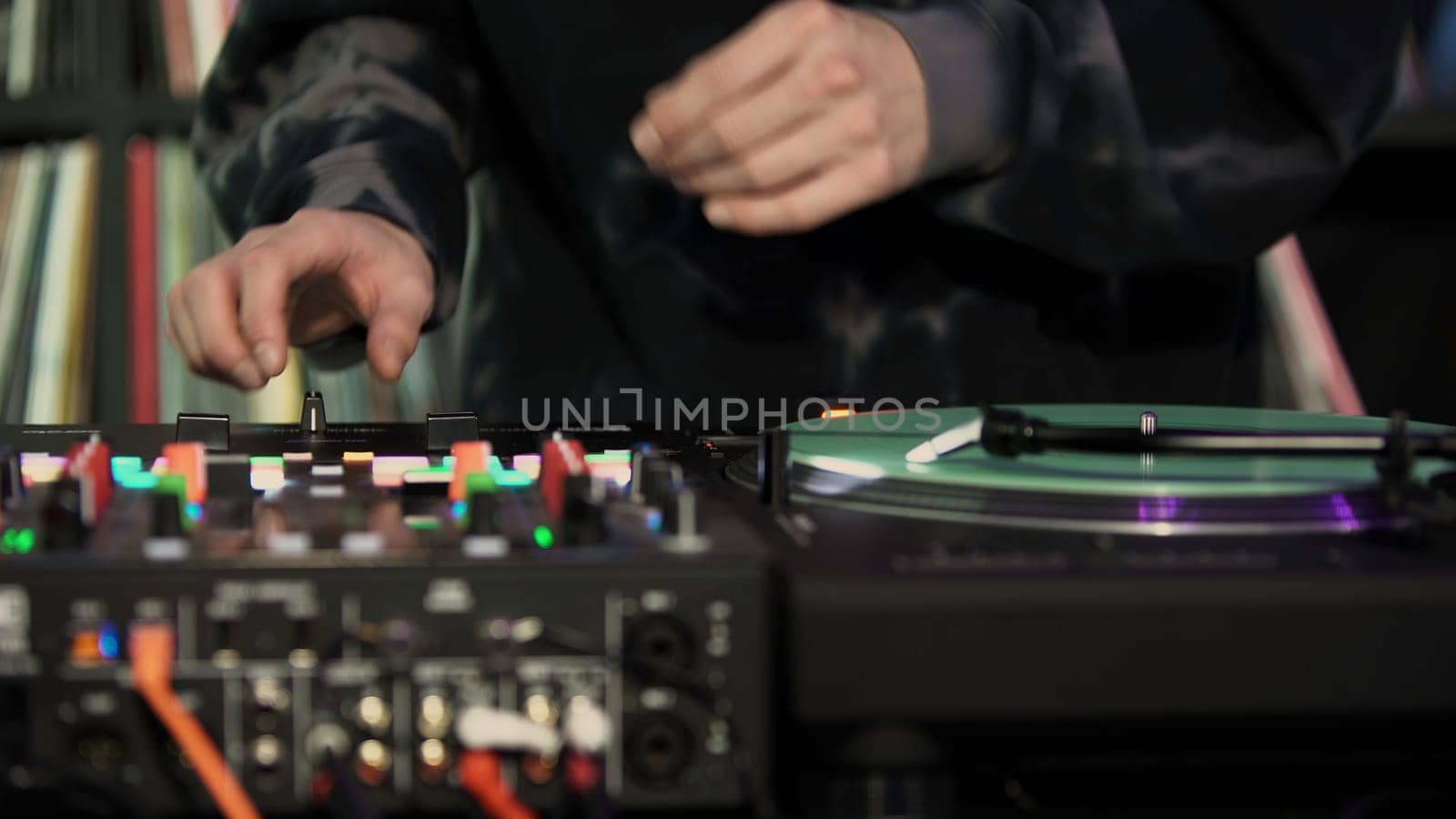DJ party. Art. A man creating music at a party with special equipment. High quality 4k footage