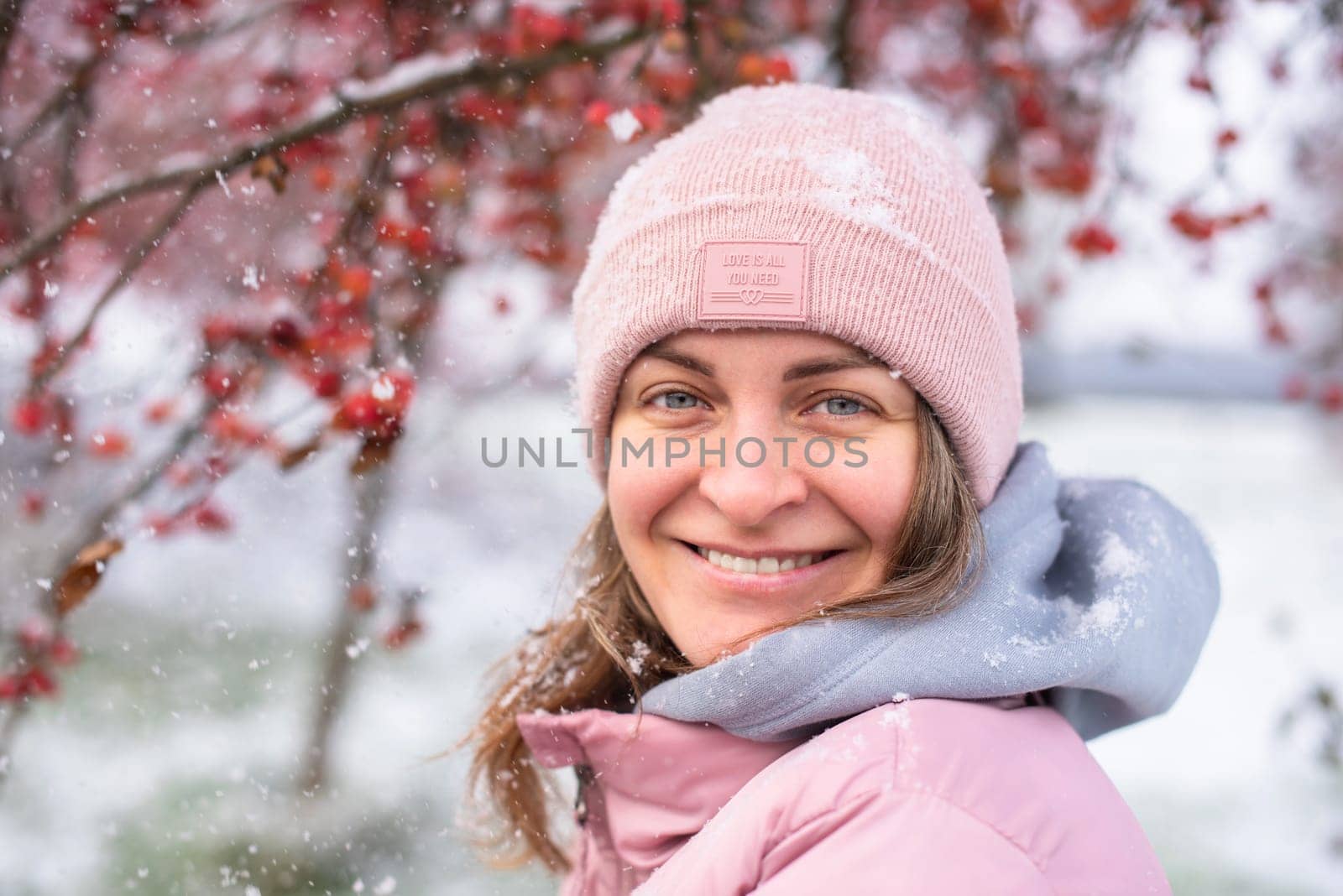 Winter Elegance: Portrait of a Beautiful Girl in a Snowy European Village