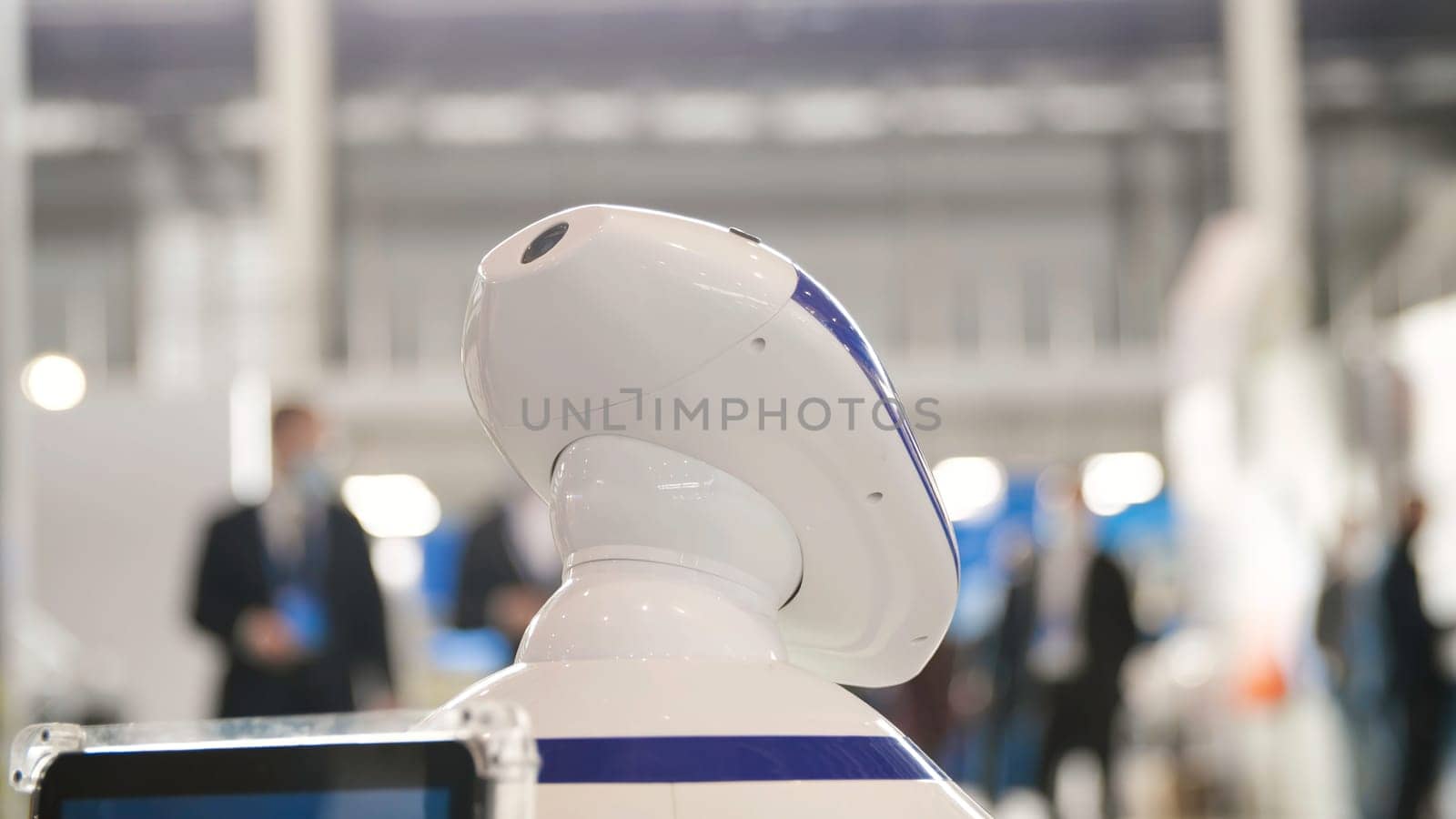 Man stroking robot like pet. Media. Close-up of human hand stroking head of robot dog. New futuristic robots in form of Pets.