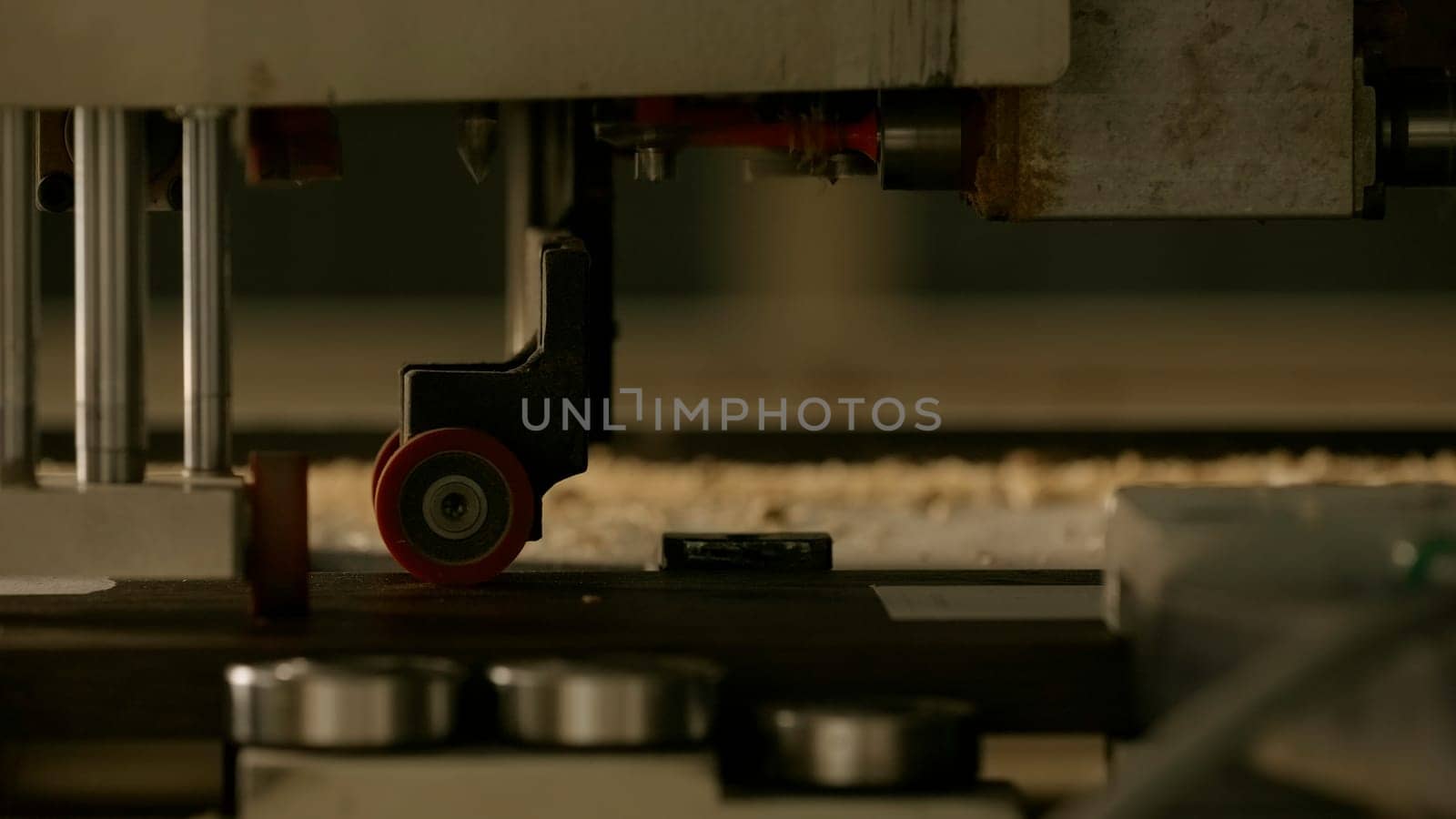 Working new technologies. Creative. Sawing and inserting nails into wood machine that works quickly. High quality 4k footage