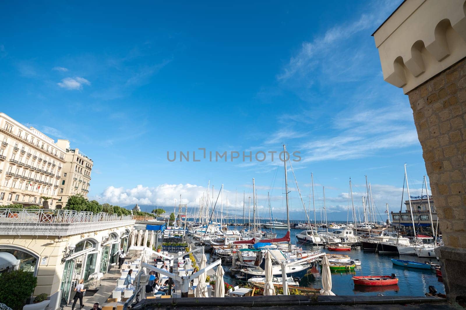 Porticciolo Santa Lucia di Napoli on a sunny day with Vesuvius in the background in the year 2023. by martinscphoto