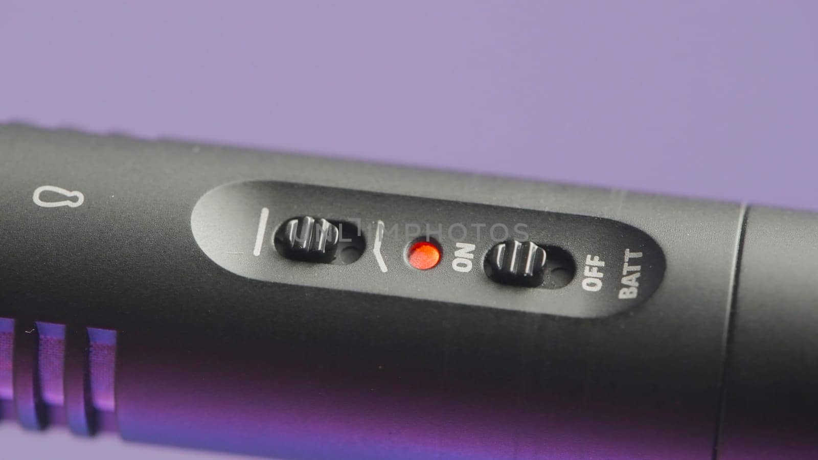 Details of modern microphone. Action. Details of microphone gun for high-quality sound recording in studio. Microphone for singing on isolated background.