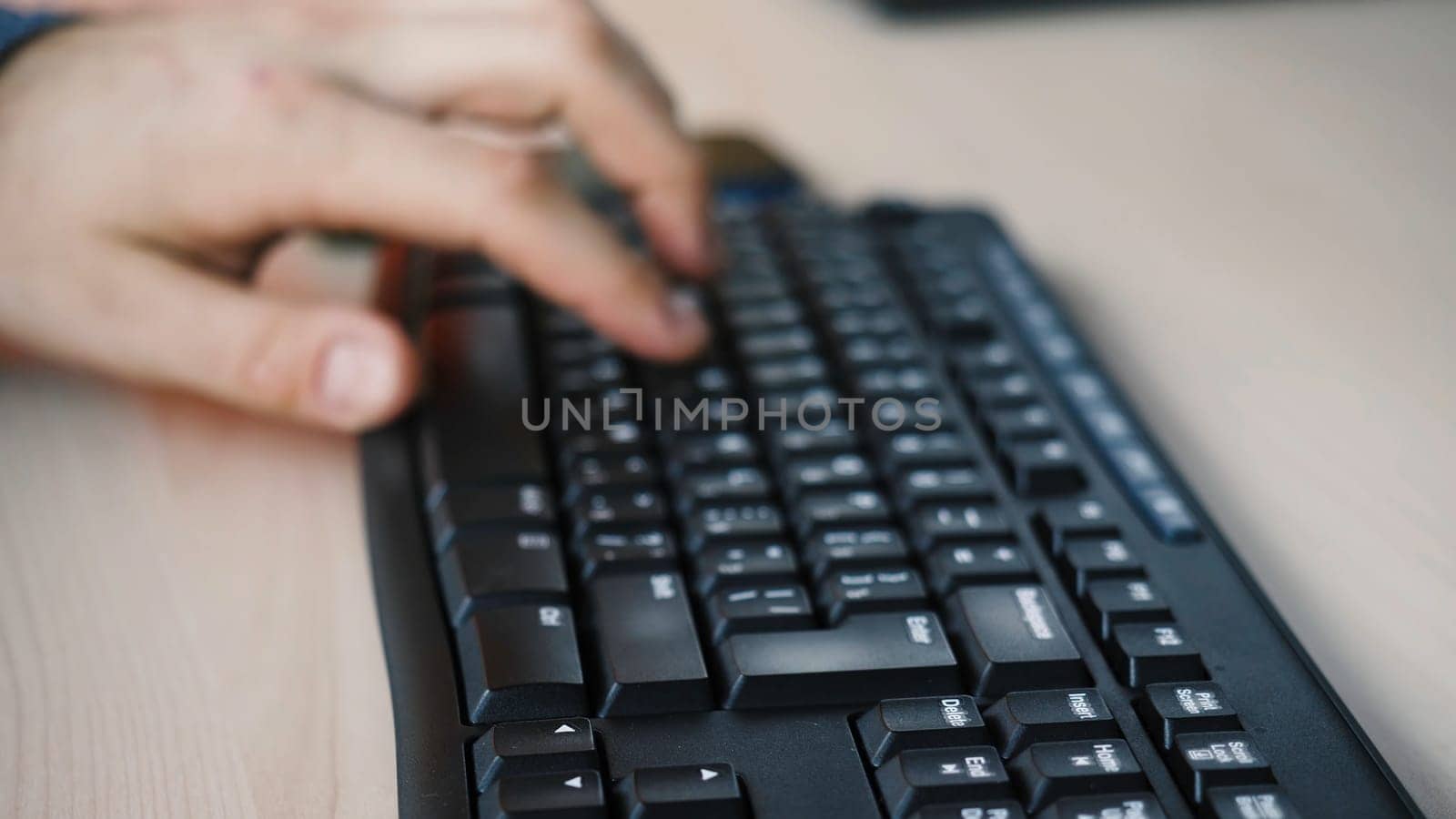 Business, education, programming, people and technology concept ,Businessman working in office hand on keyboard writing a blog or professional manager using portable computer at office close up.